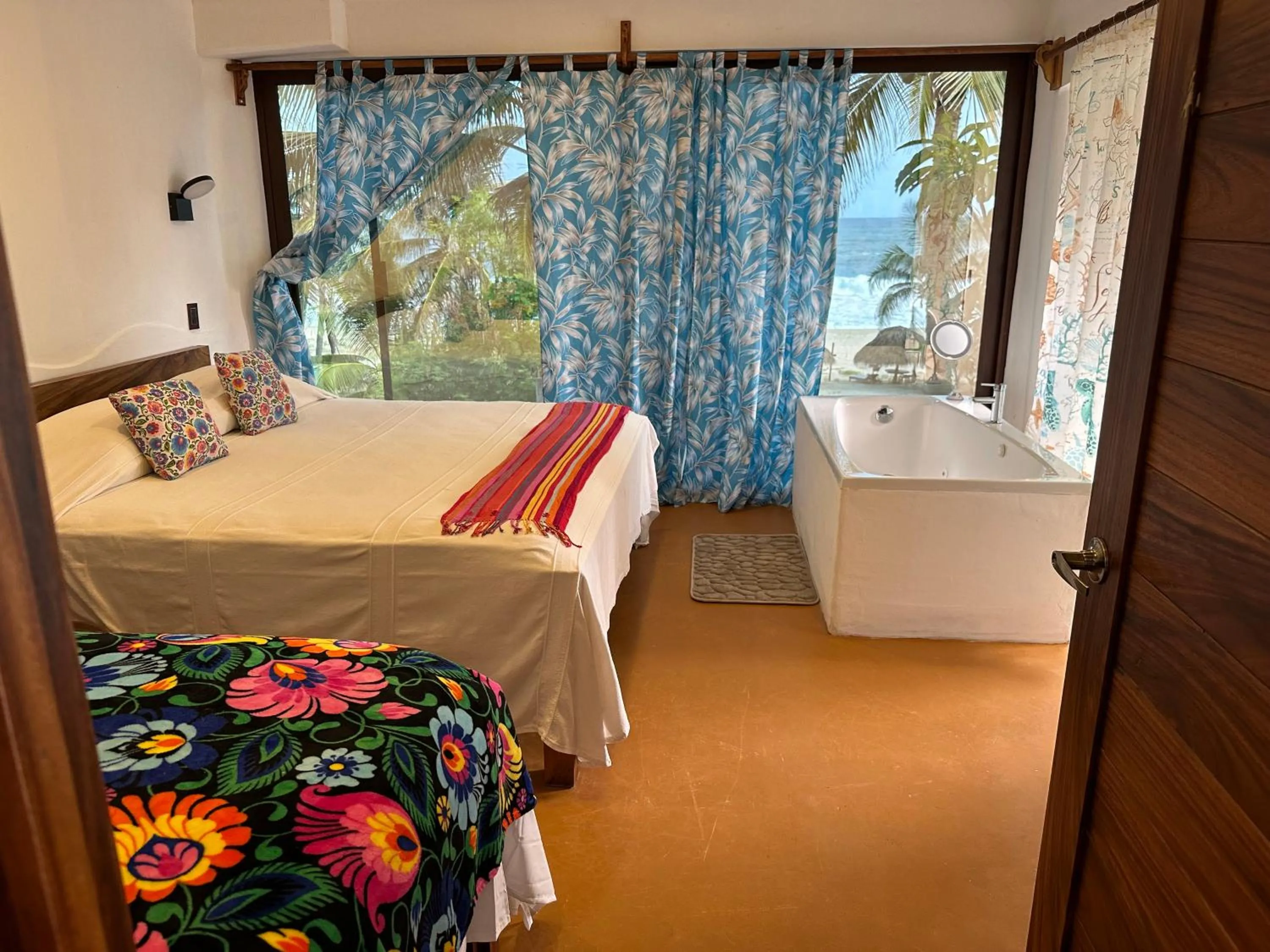 Bed in Beachfront Paradise Boutique Hotel