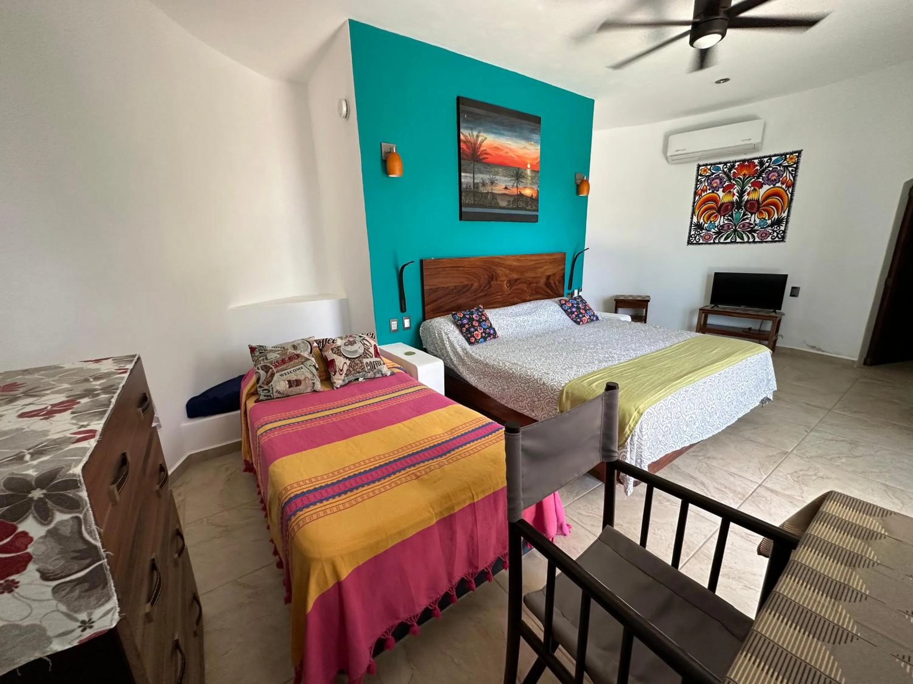 Photo of the whole room, Bed in Beachfront Paradise Boutique Hotel