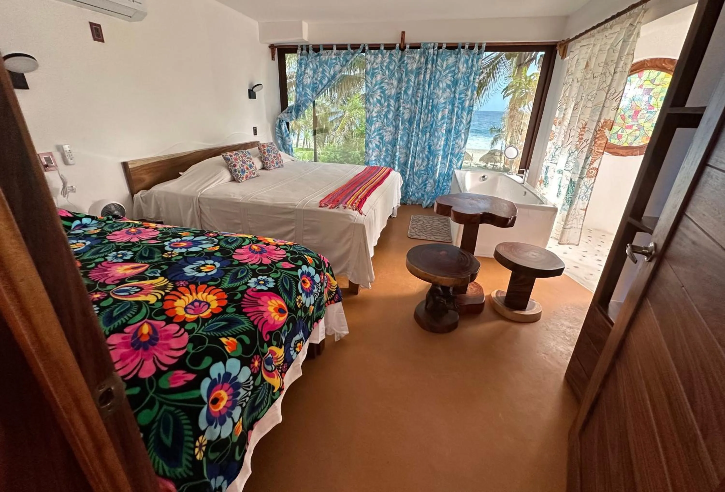 Bed in Beachfront Paradise Boutique Hotel