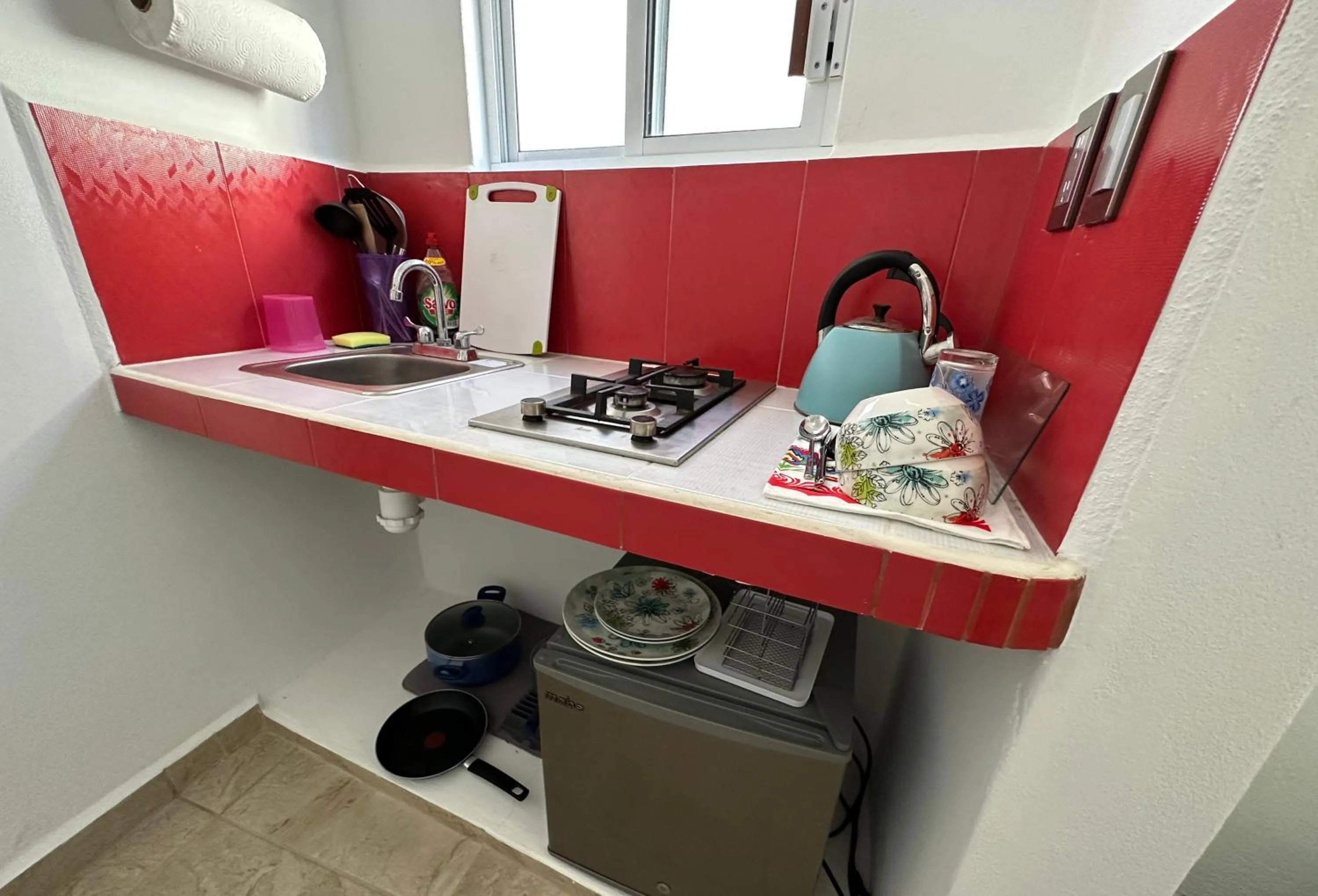 Kitchen or kitchenette in Beachfront Paradise Boutique Hotel