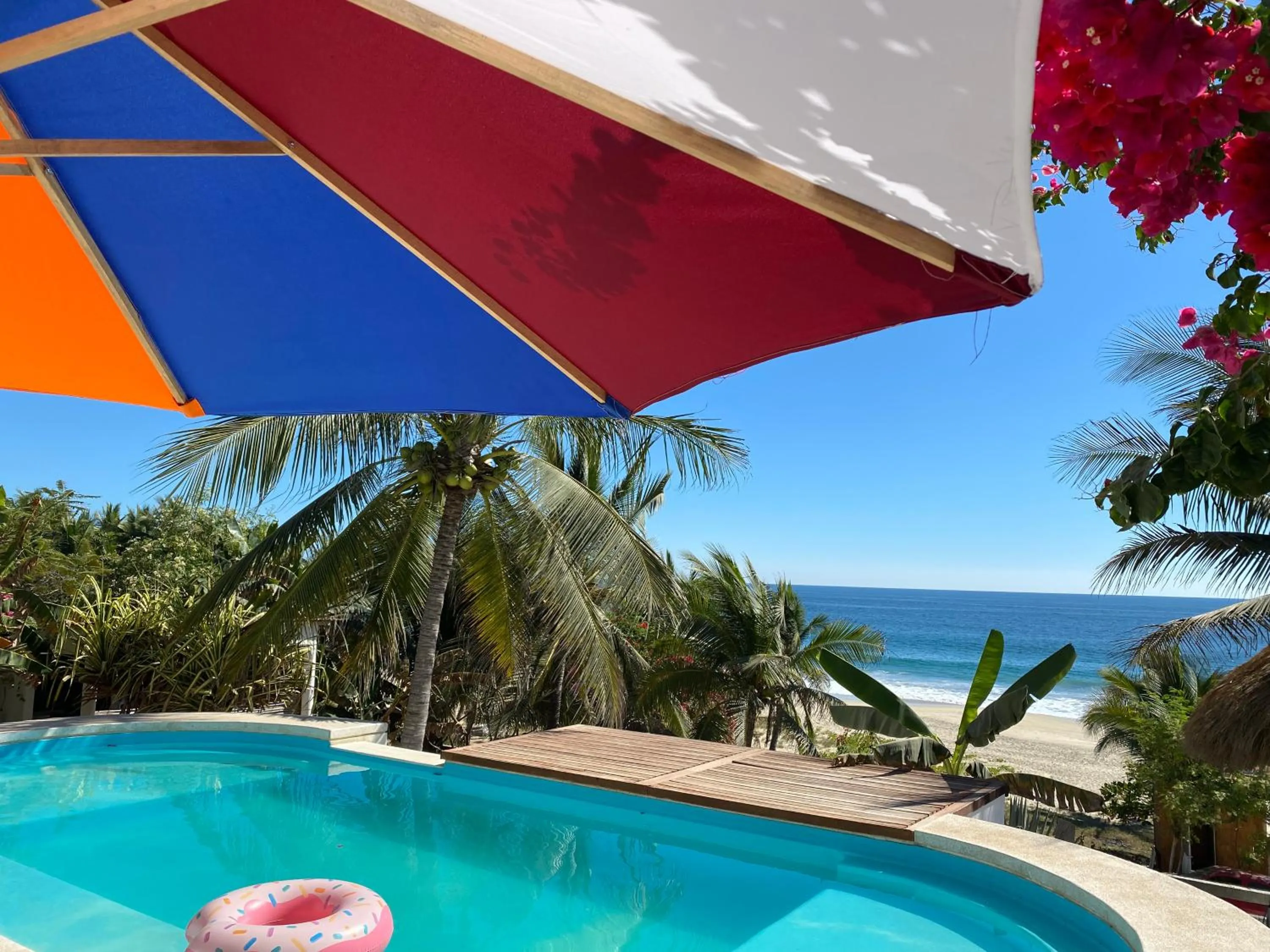 Pool view in Beachfront Paradise Boutique Hotel
