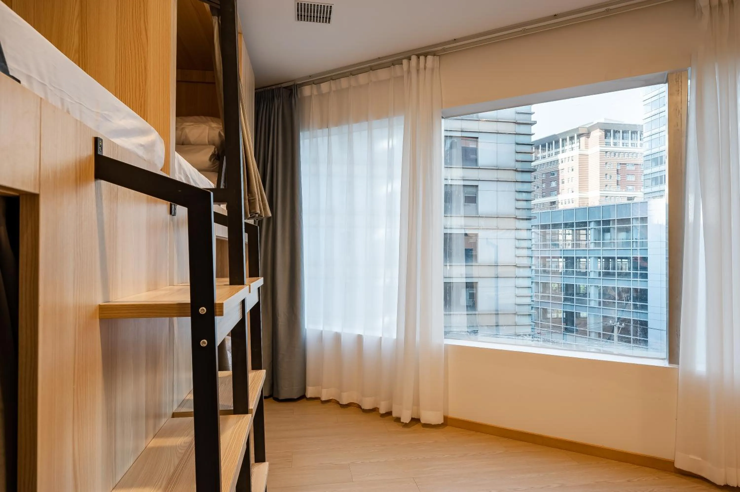 Photo of the whole room in Dayin International Youth Hostel - East Nanjing Road & People's Square & The Bund Branch