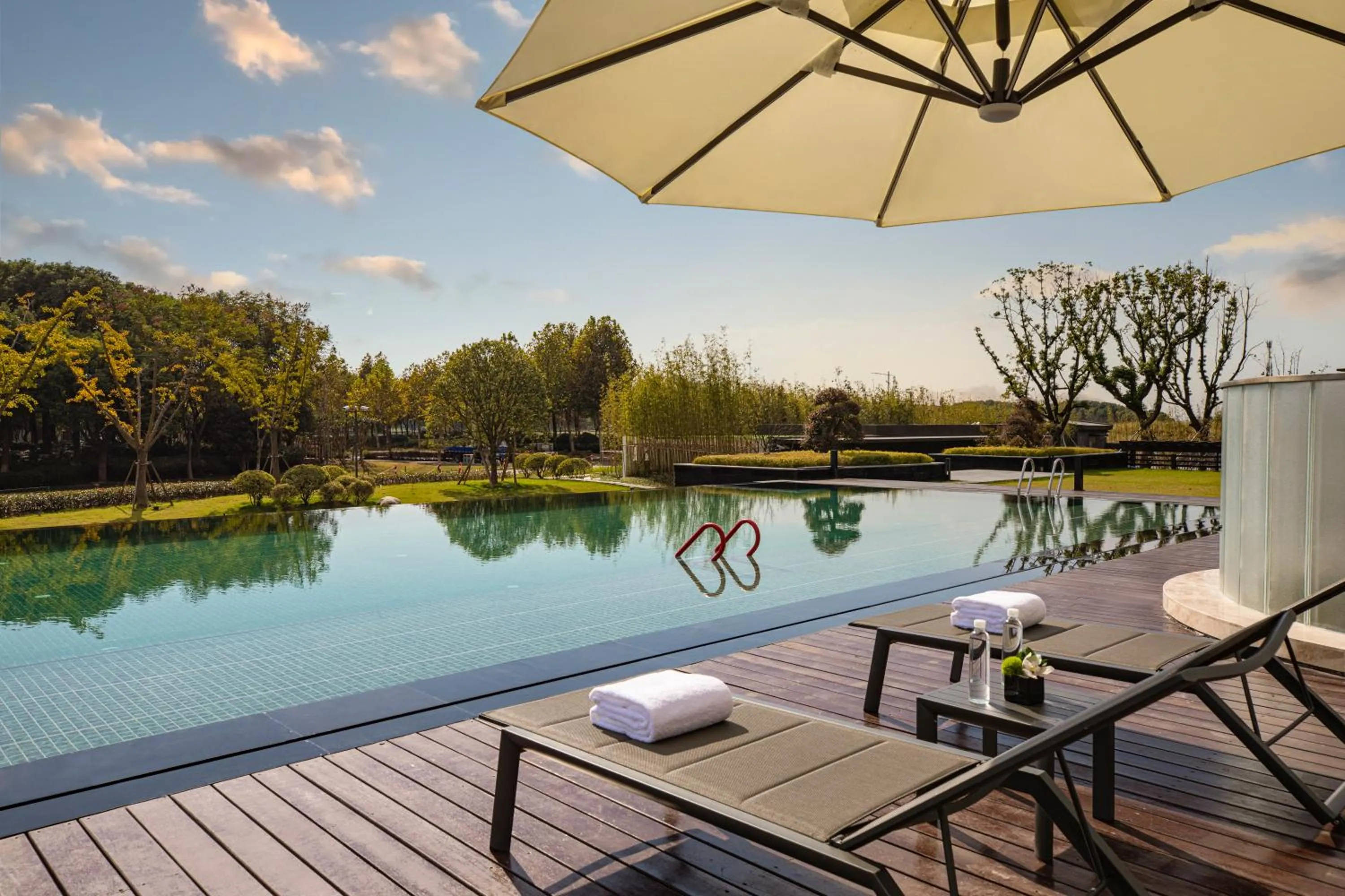 Swimming pool in Hotel Indigo Suzhou Yangcheng Lake by IHG