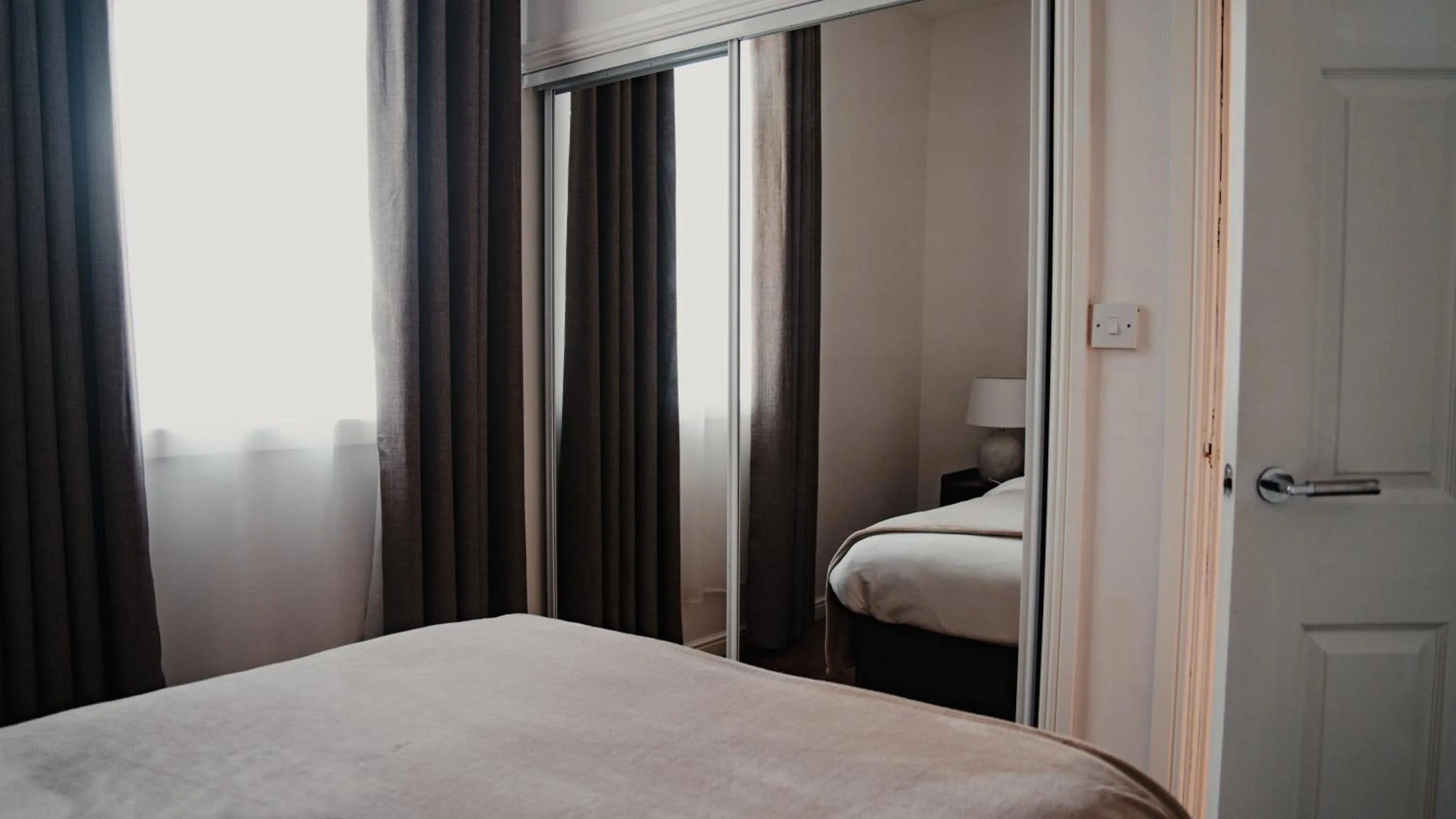 Bed in Royal Chambers Serviced Apartments
