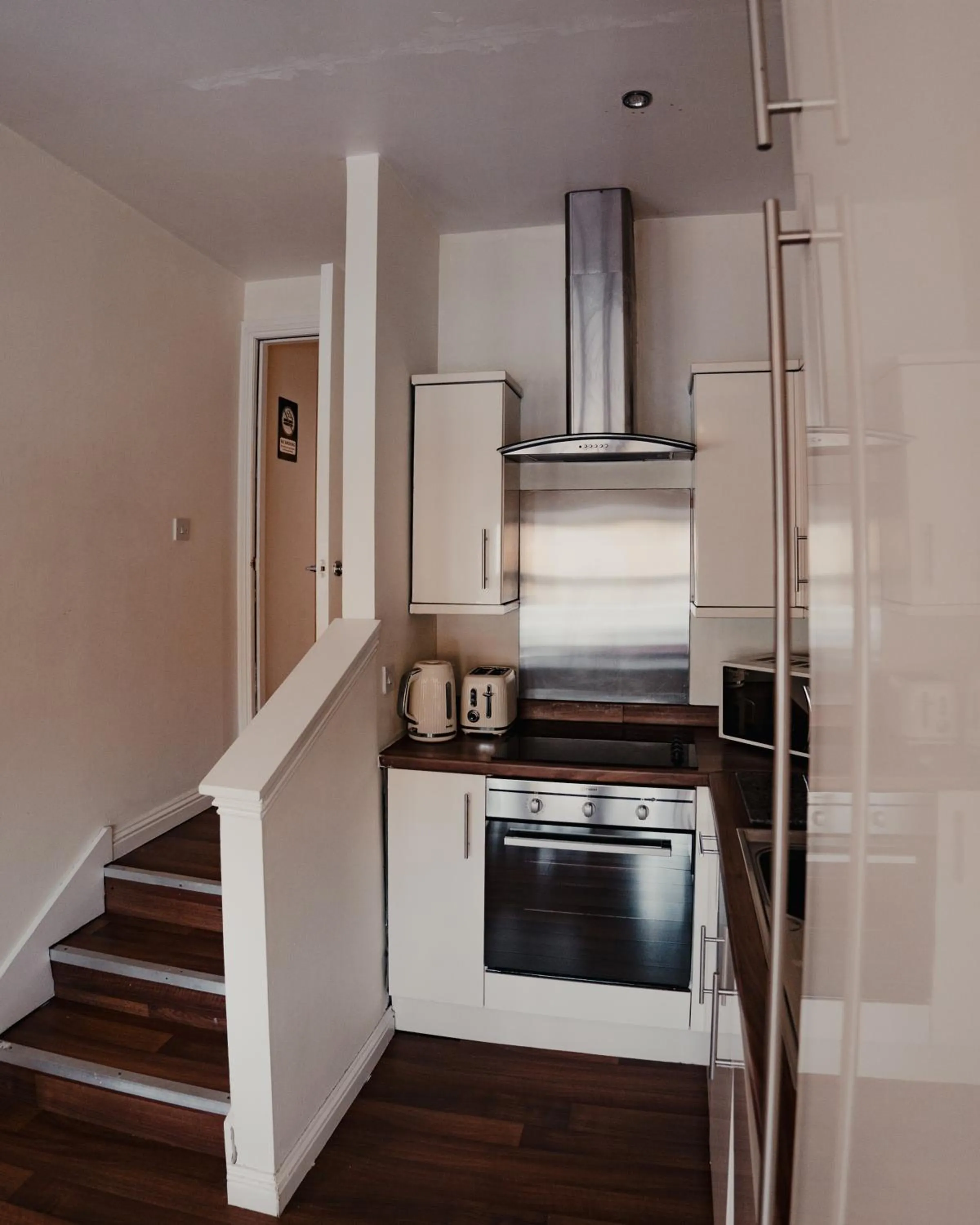 Kitchen or kitchenette in Royal Chambers Serviced Apartments