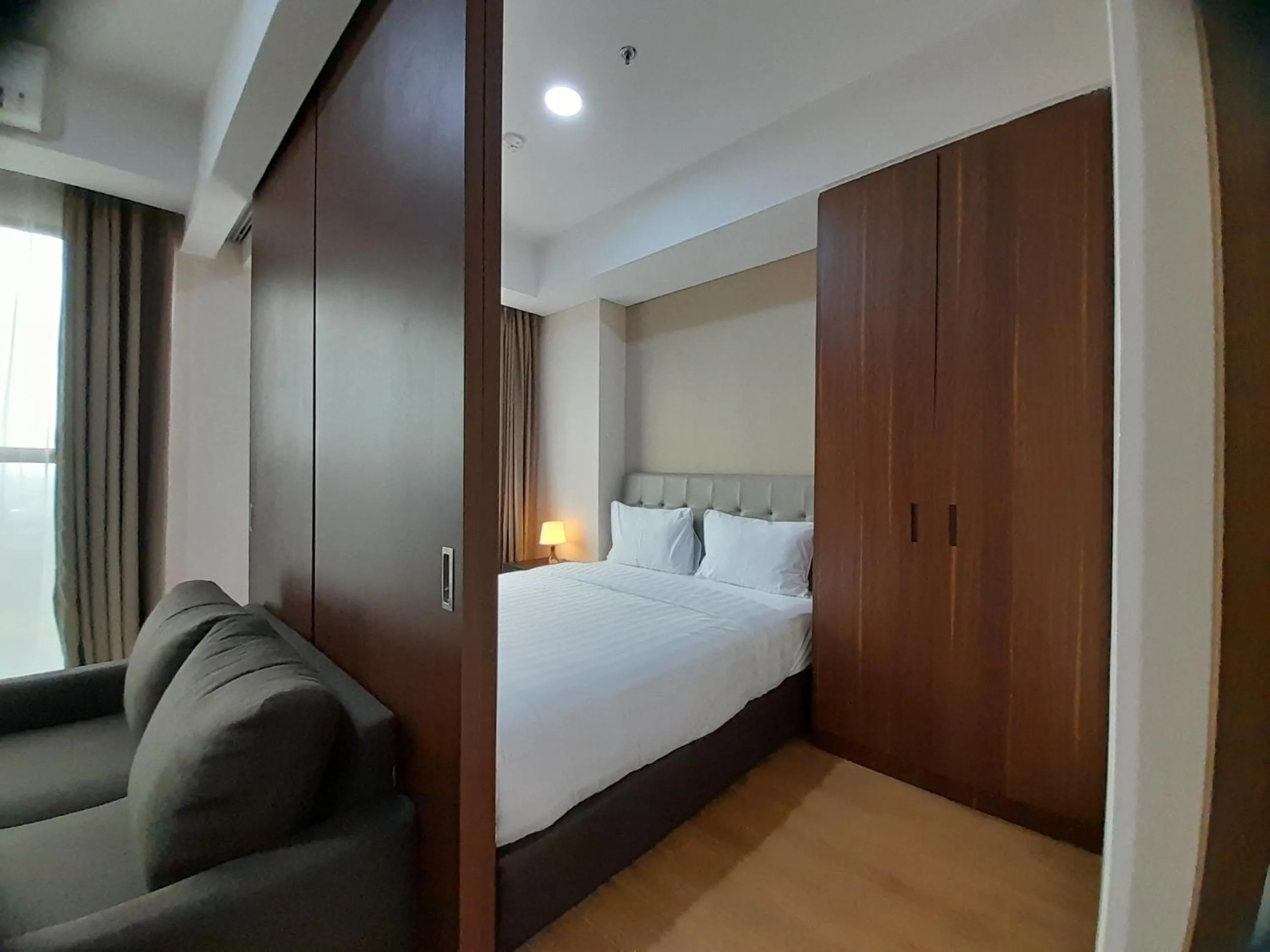 Living room, Bed in Kawana Golf Residence