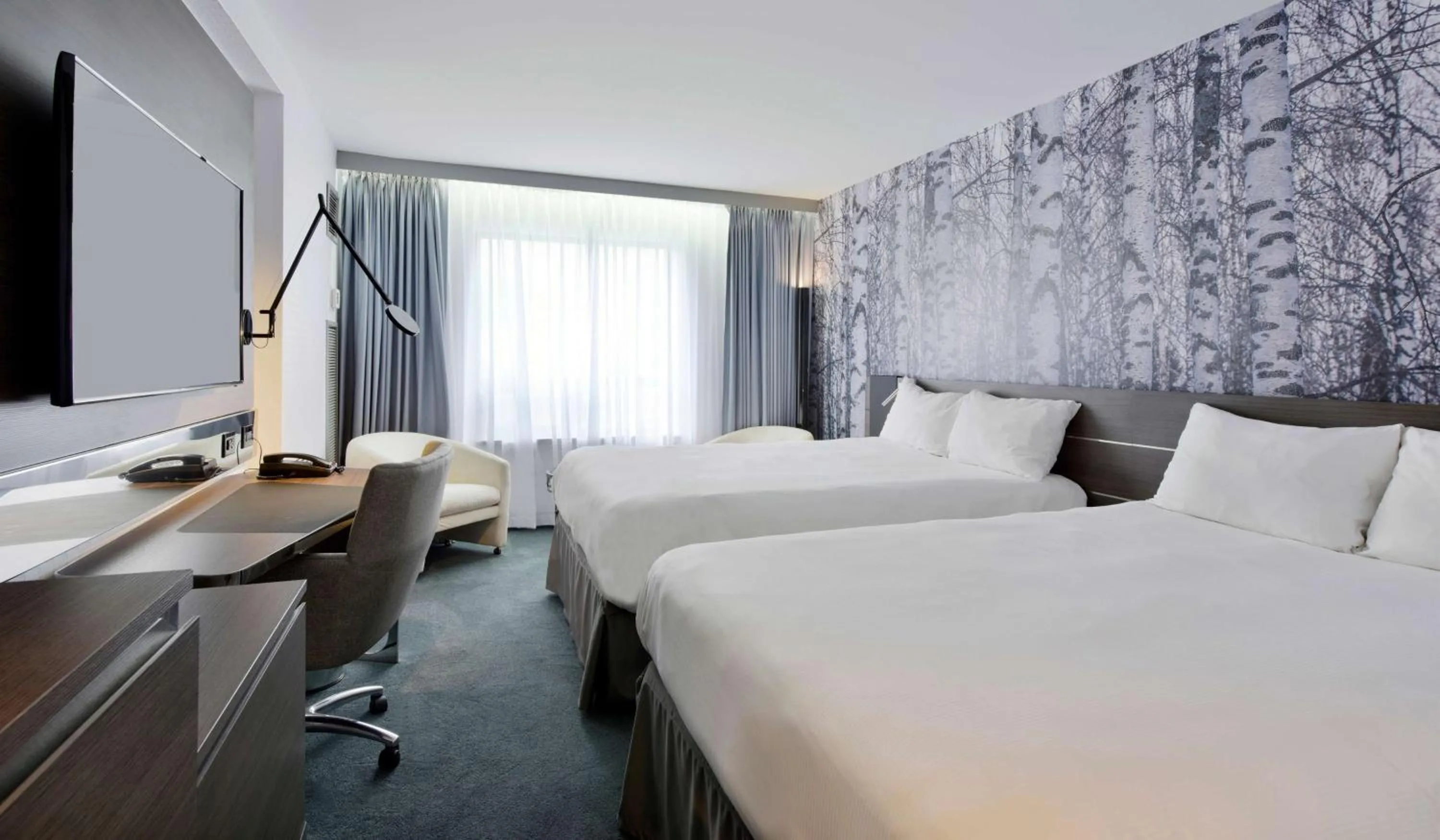 Bed in Novotel Ottawa City Centre Hotel