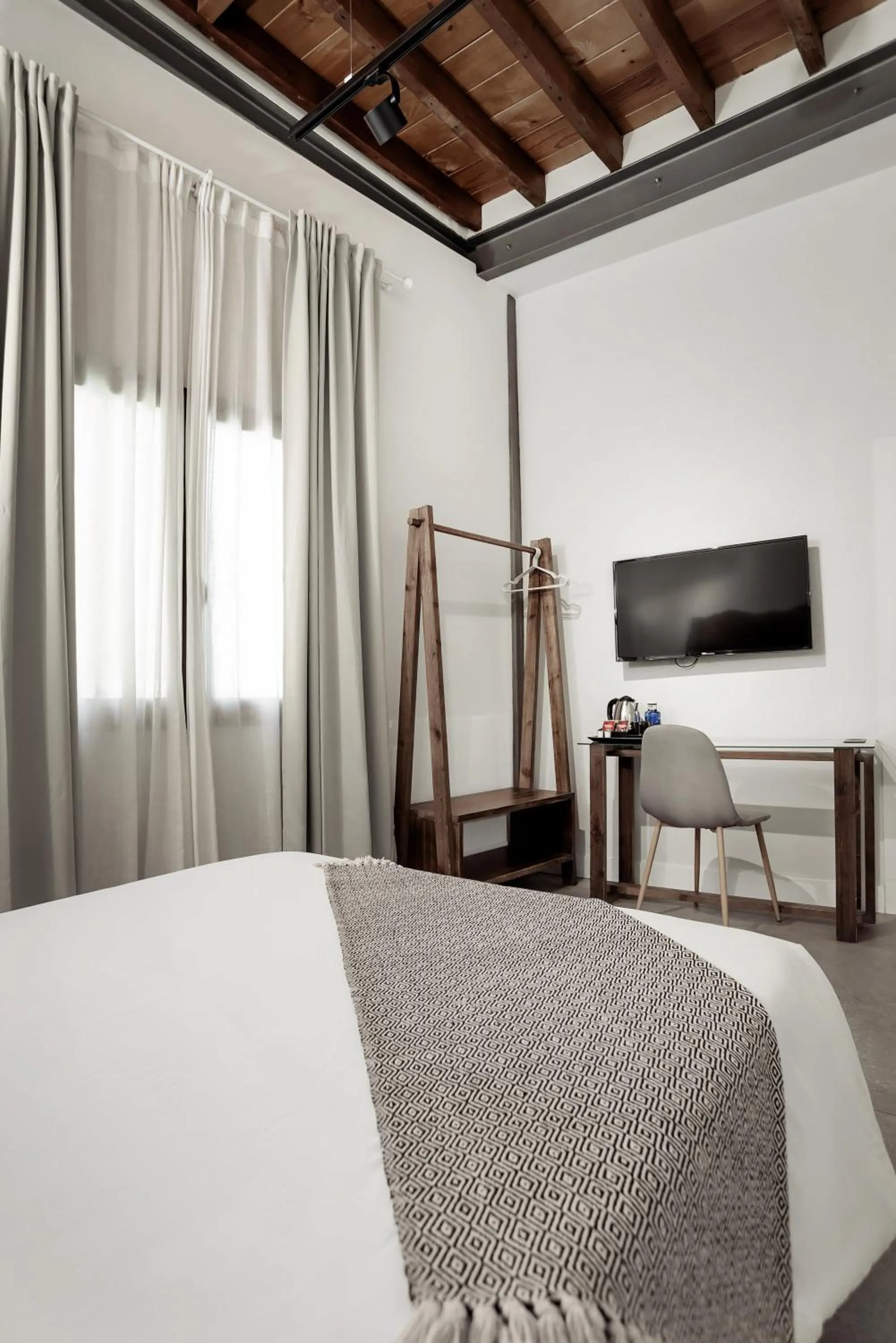 Bed in Hotel La Casa de Los Mosaicos by Maxi Hoteles