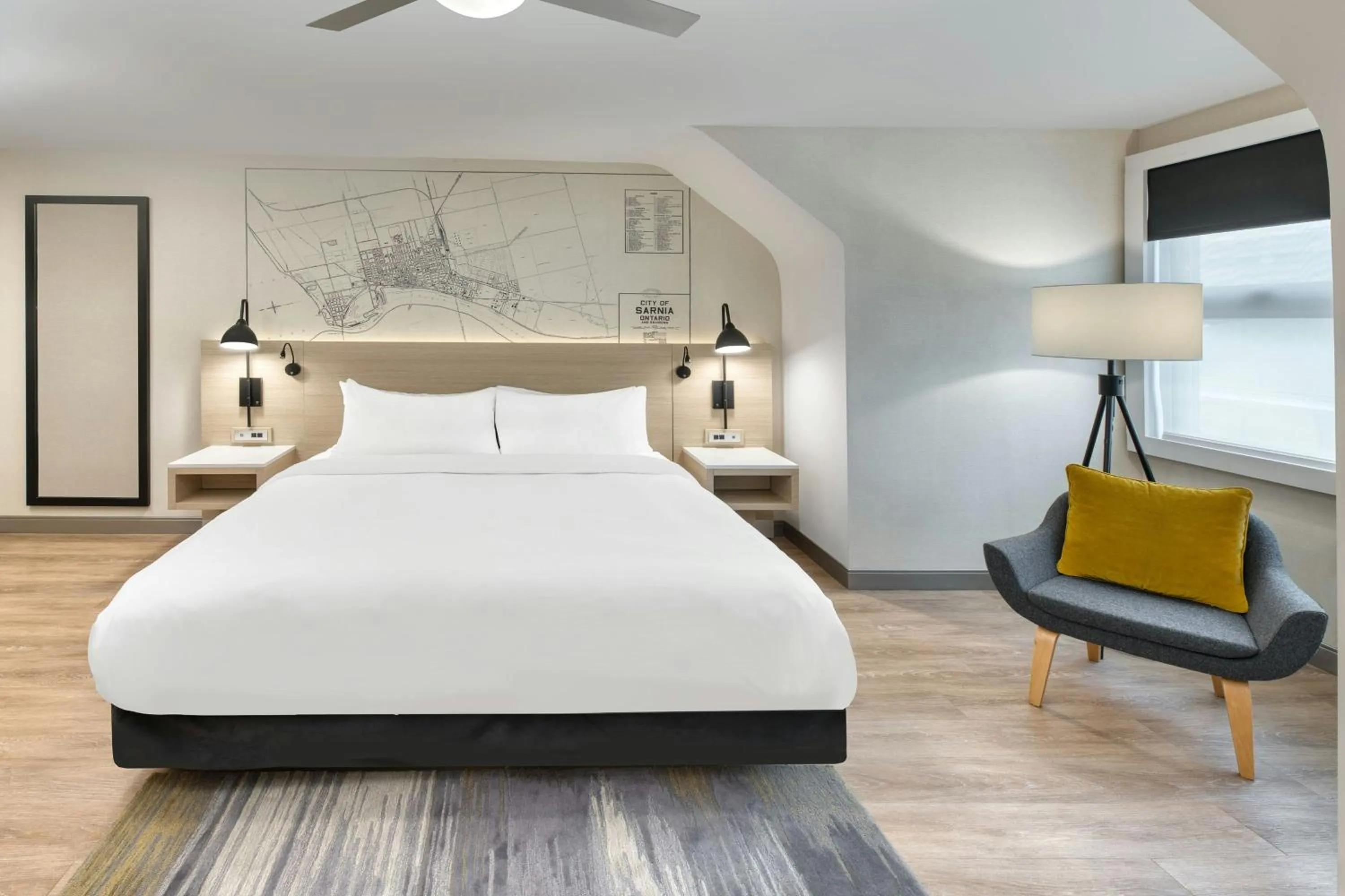 Bedroom, Bed in The Insignia Hotel, Sarnia, a Tribute Portfolio Hotel