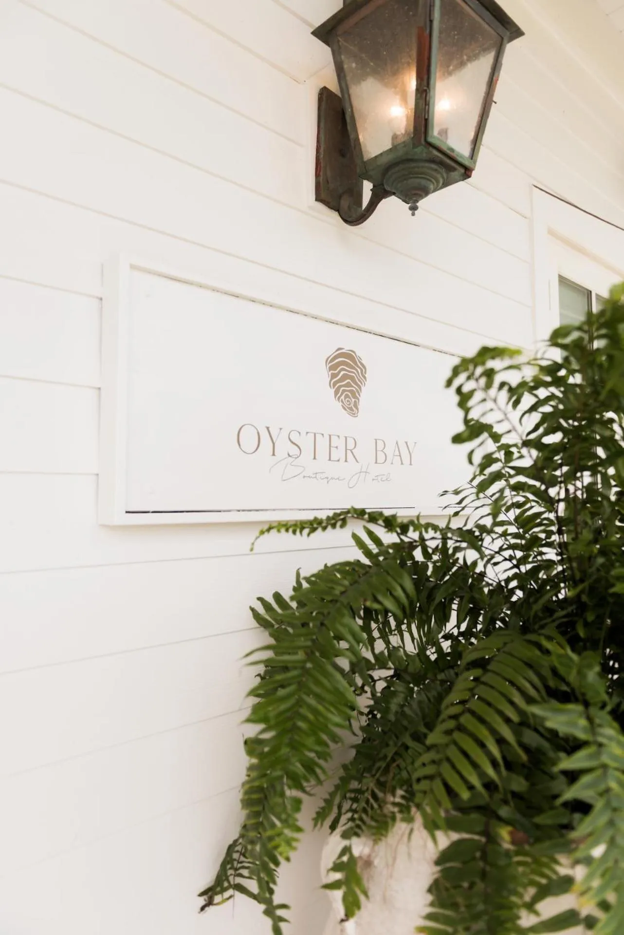 Logo/Certificate/Sign in Oyster Bay Boutique Hotel