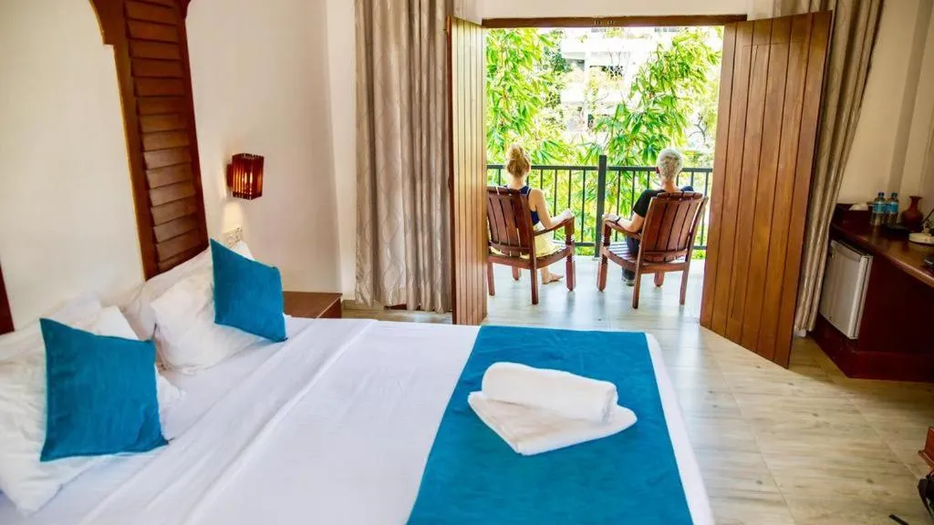 Bed in Sundaras Resort & Spa Dambulla