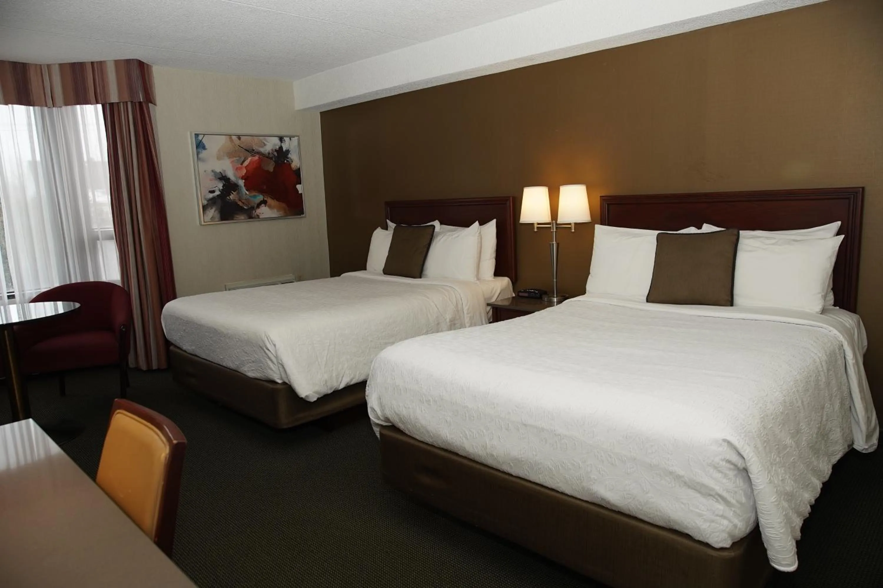 Bed in Hôtel WelcomInns