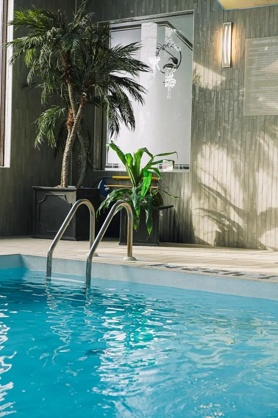 Swimming pool in Hôtel WelcomInns Swimming pool in Hôtel WelcomInns