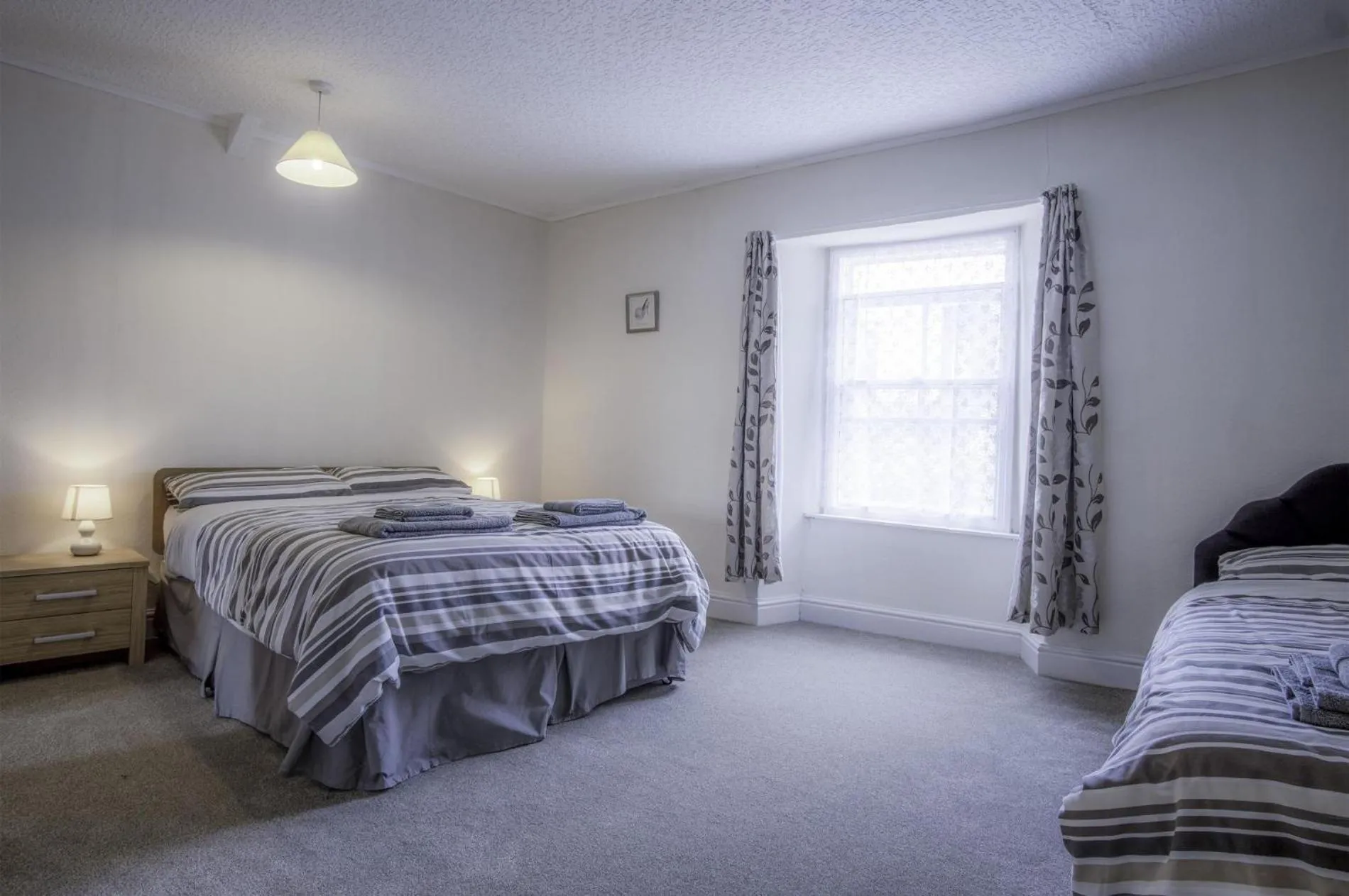 Floor plan, Bed in Dragons Den - 2 Bedroom Apartment - Tenby