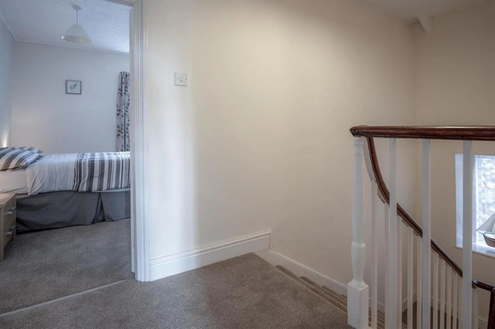 Floor plan, Bed in Dragons Den - 2 Bedroom Apartment - Tenby