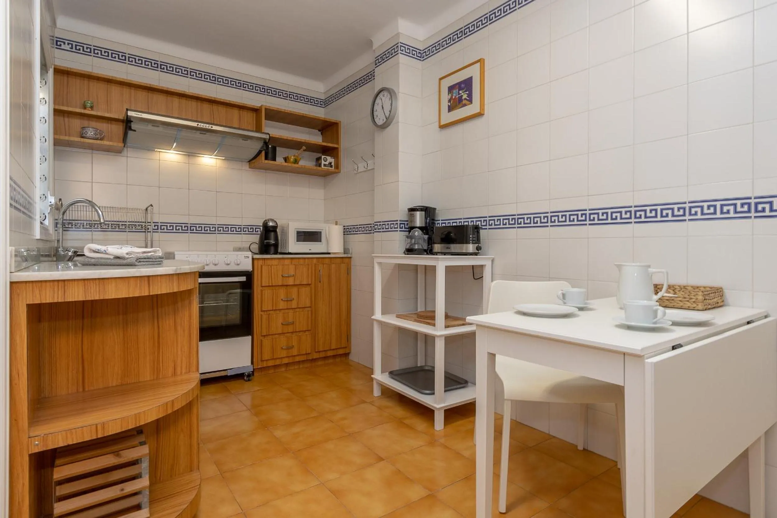 kitchen in Apartment Almirall in Puerto Pollensa By homevillas360