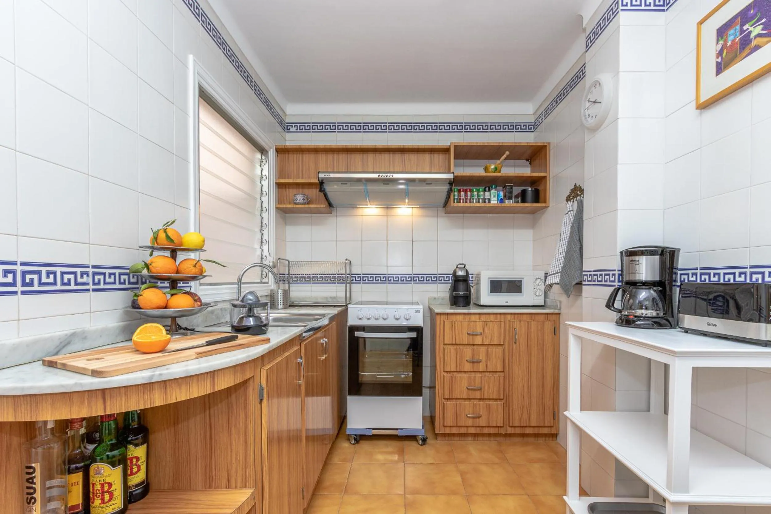 Kitchen or kitchenette in Apartment Almirall in Puerto Pollensa By homevillas360