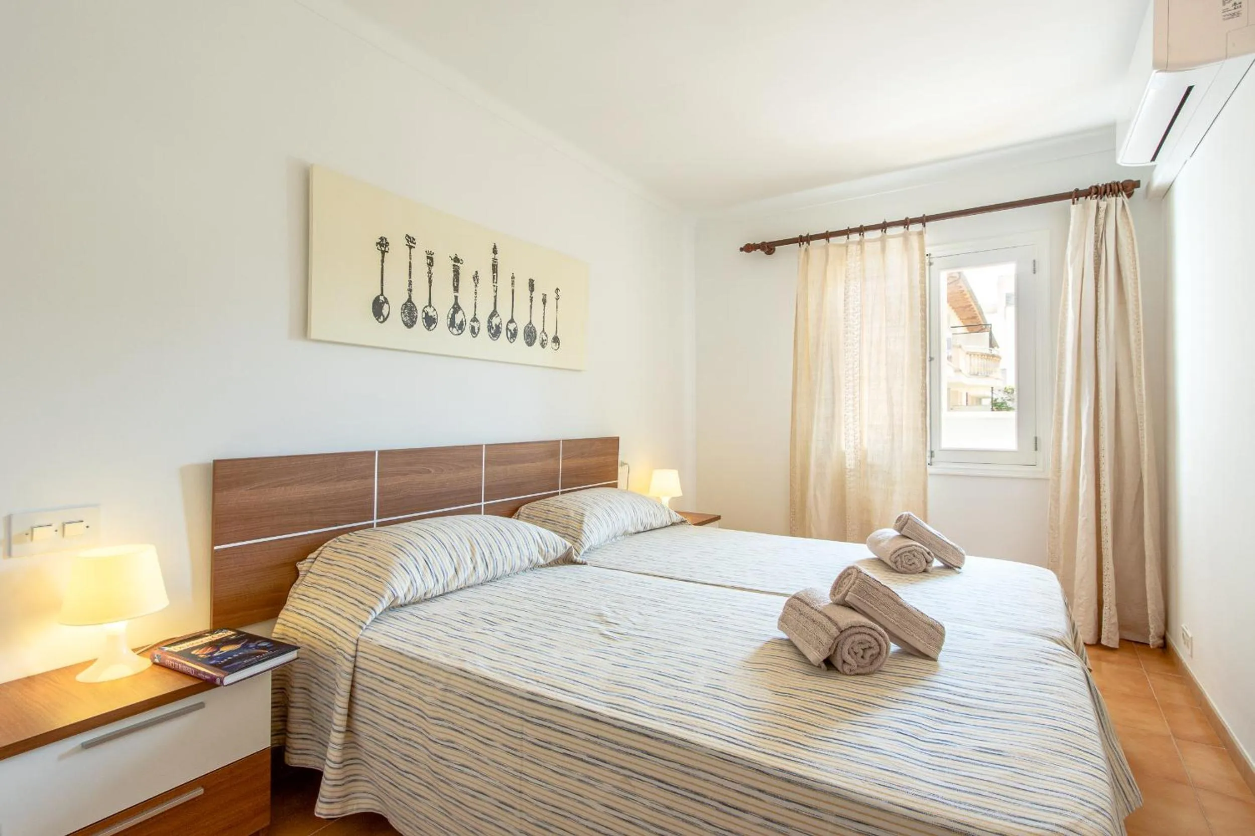 Bed in Apartment Almirall in Puerto Pollensa By homevillas360