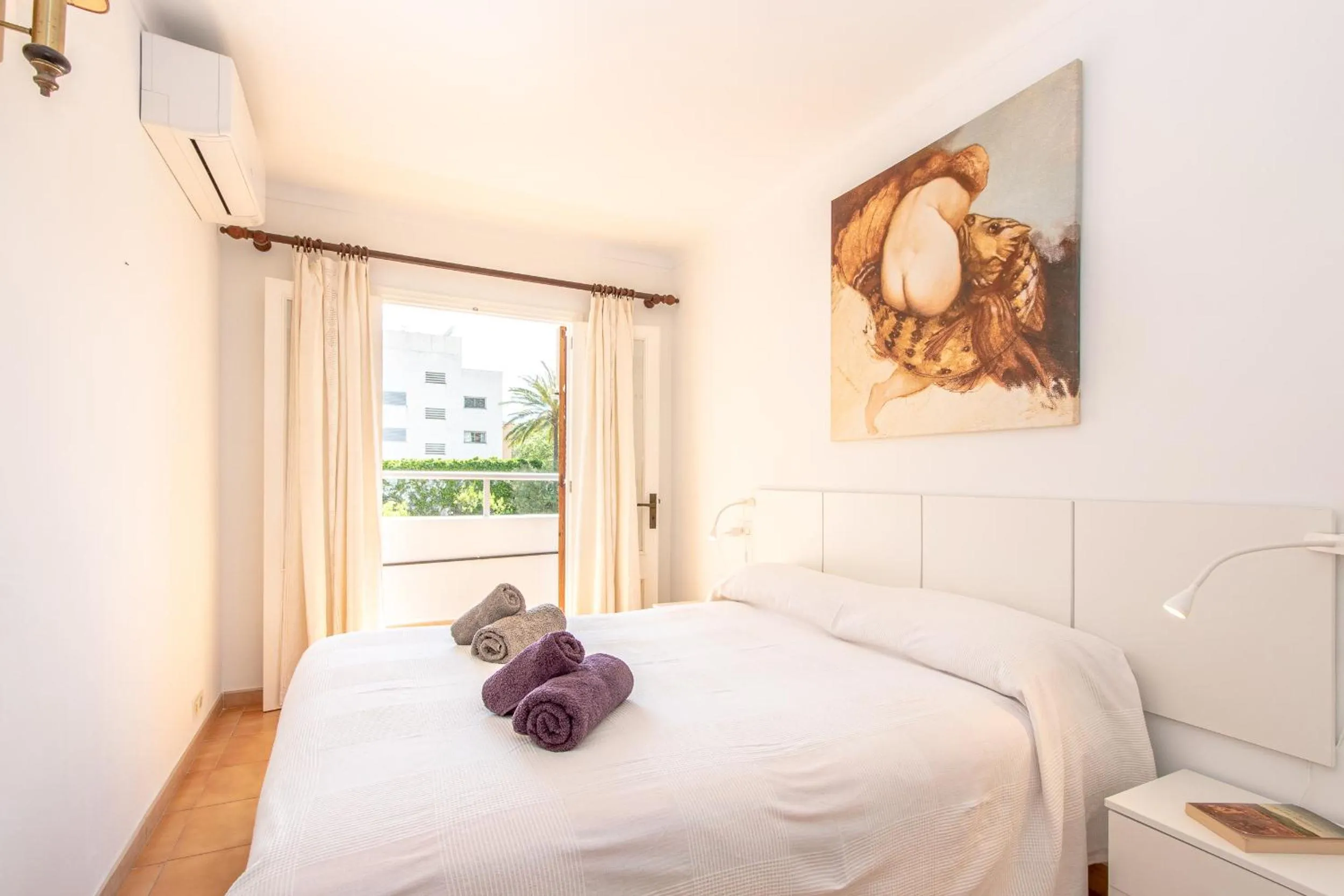 Bed in Apartment Almirall in Puerto Pollensa By homevillas360