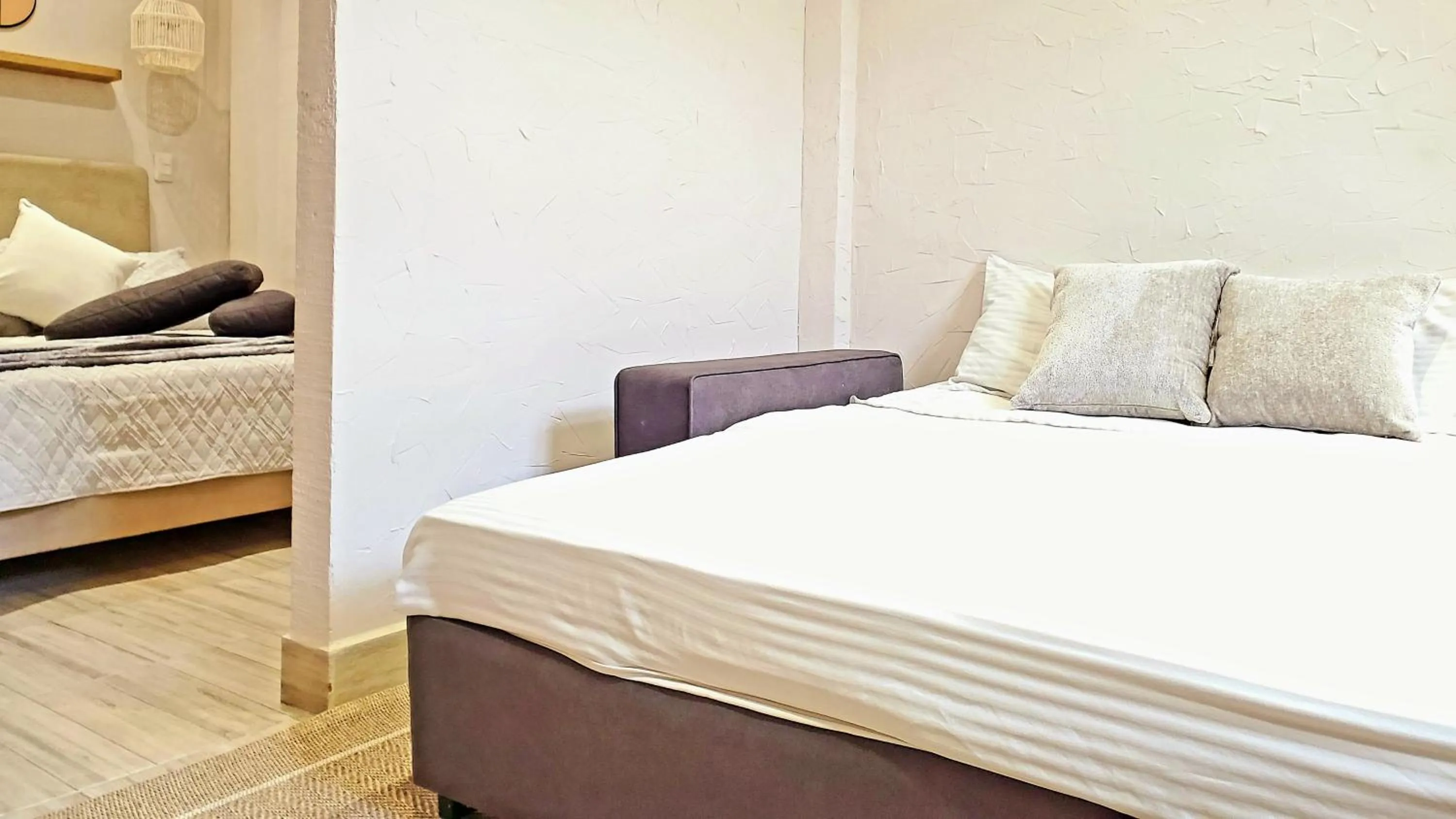 Photo of the whole room, Bed in Zentrico Boutique