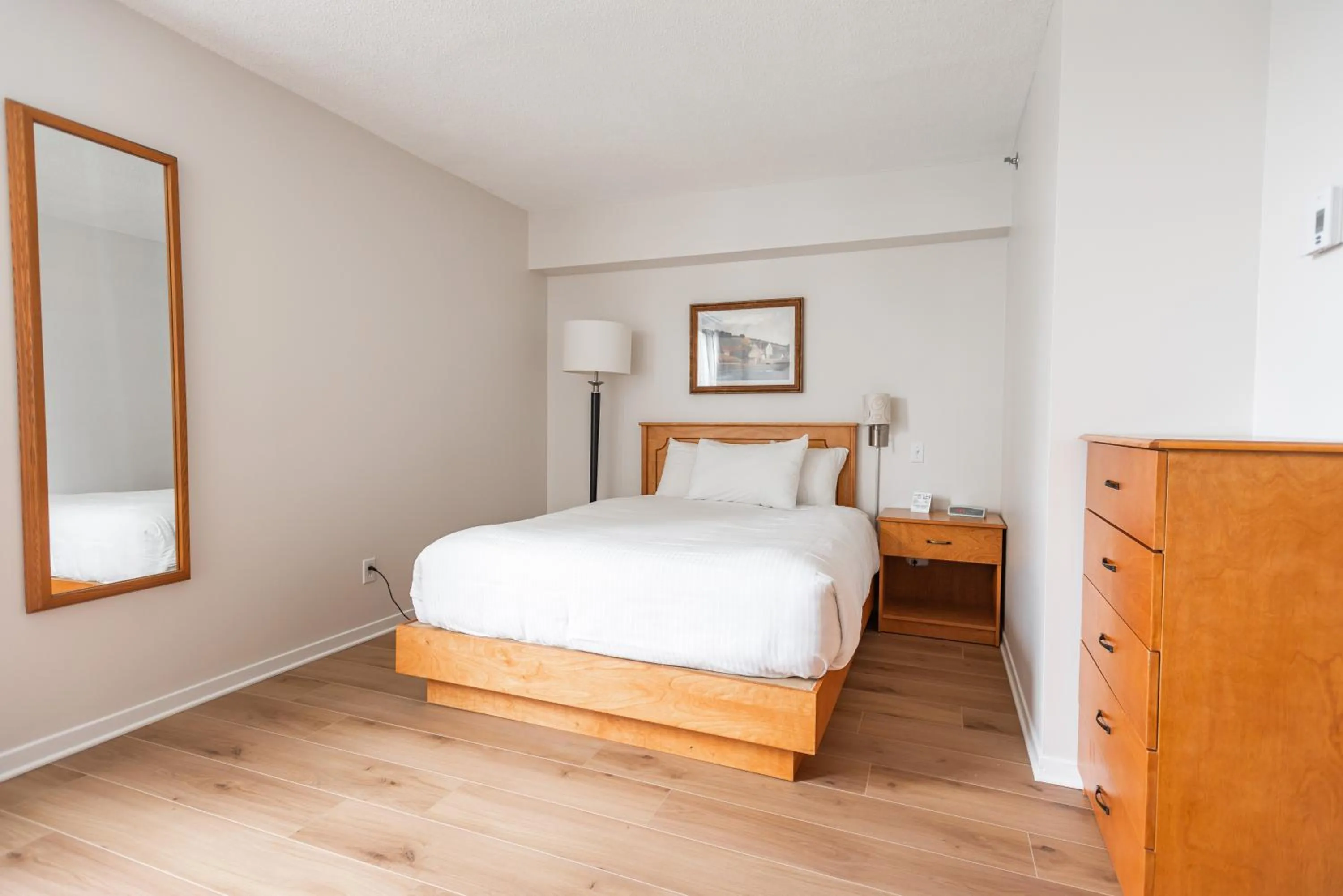 Bed in Hotel les Suites Labelle