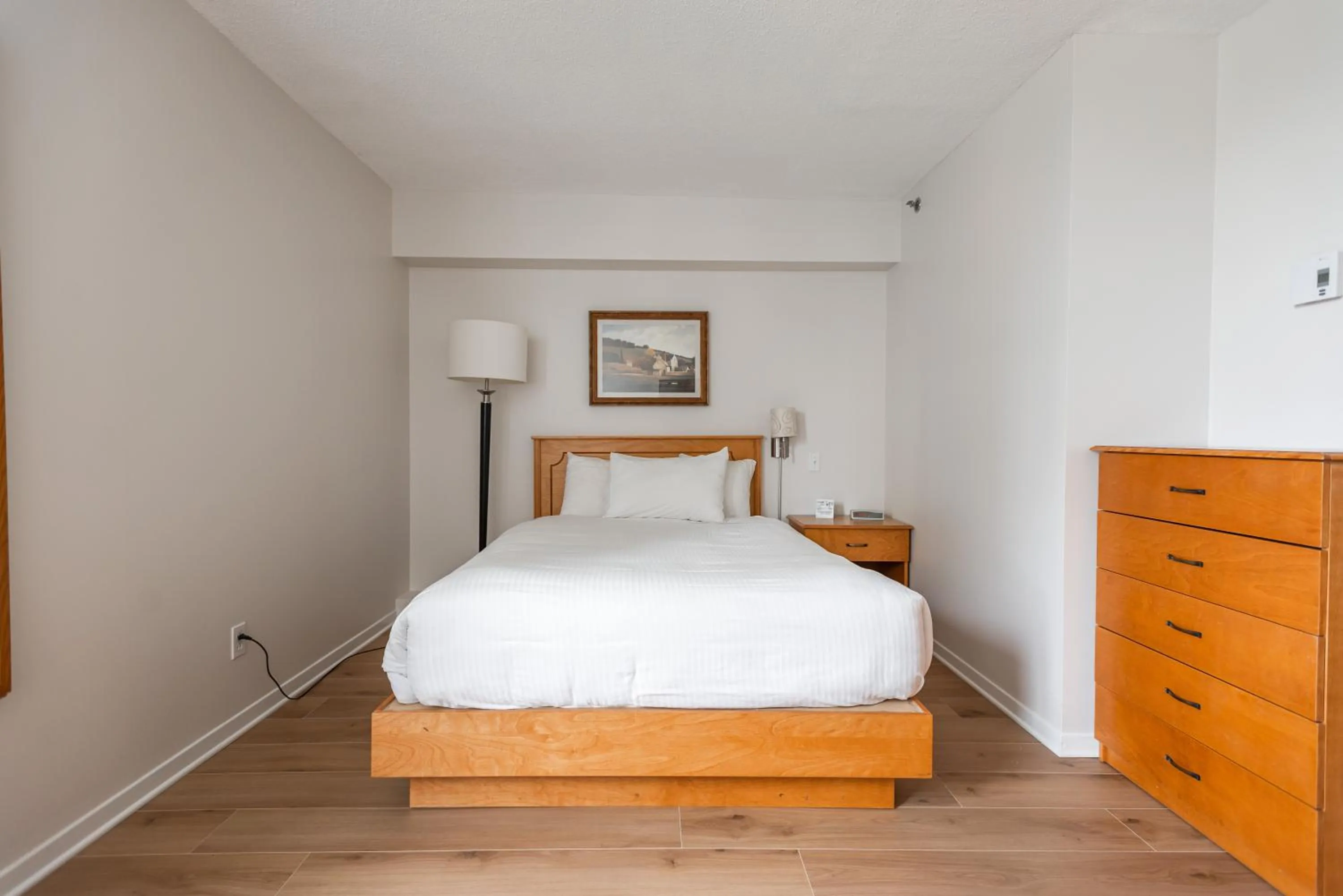 Bed in Hotel les Suites Labelle