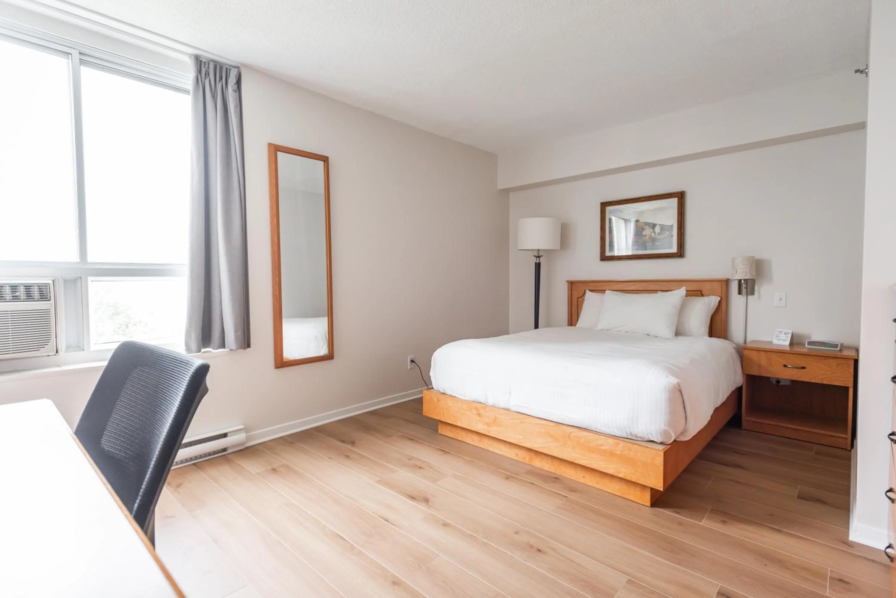 City view, Bed in Hotel les Suites Labelle