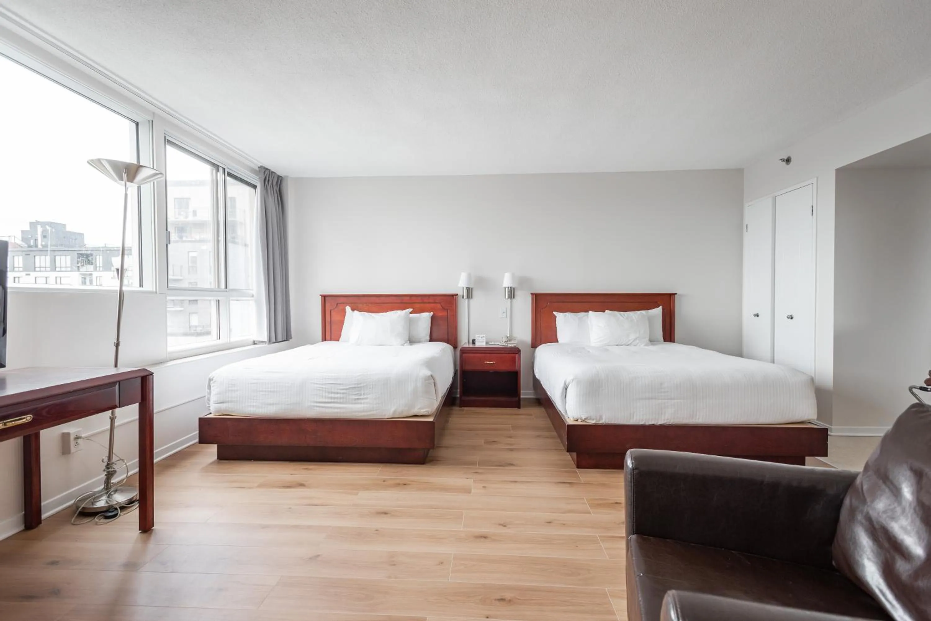 City view, Bed in Hotel les Suites Labelle