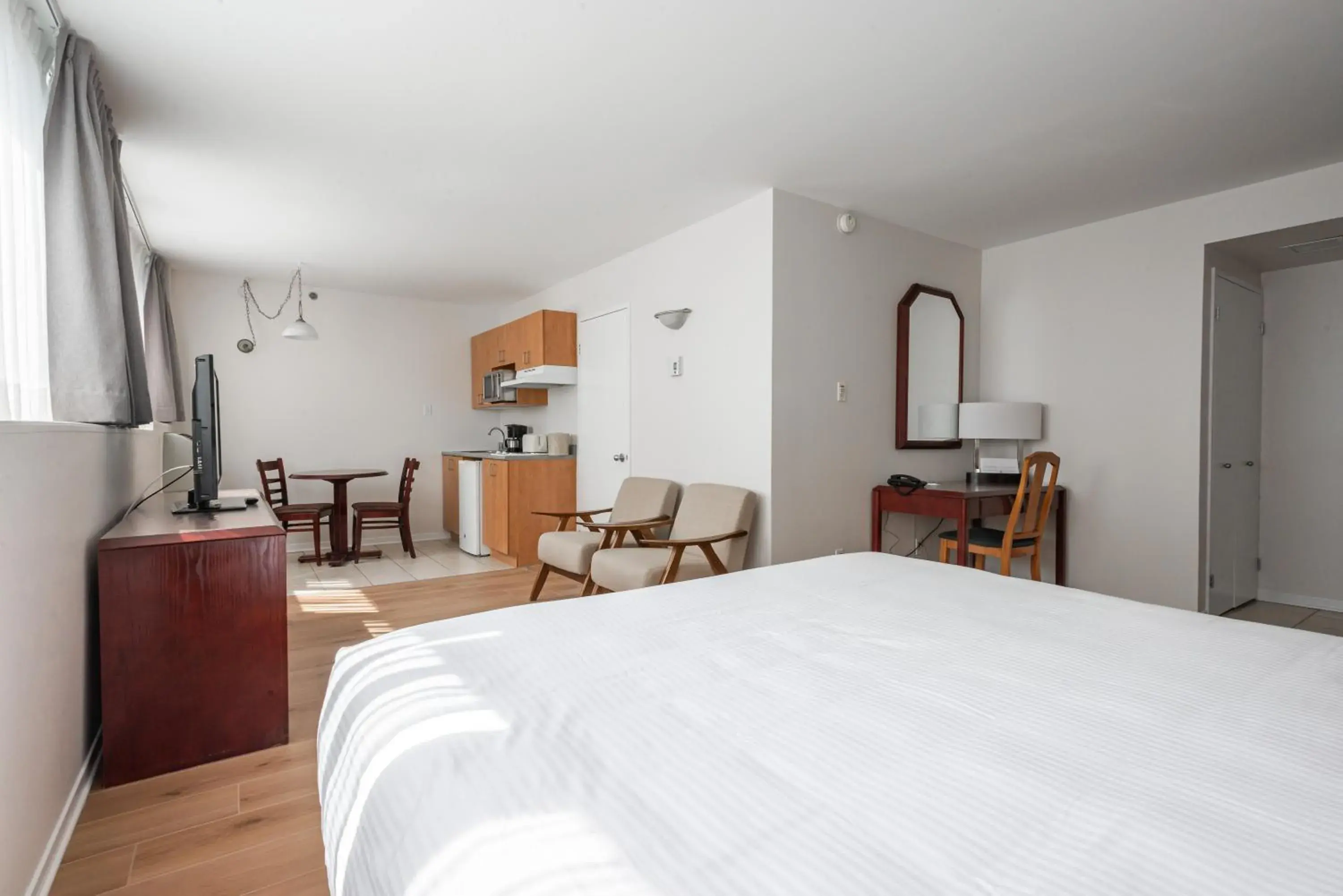 Bed in Hotel les Suites Labelle Bed in Hotel les Suites Labelle