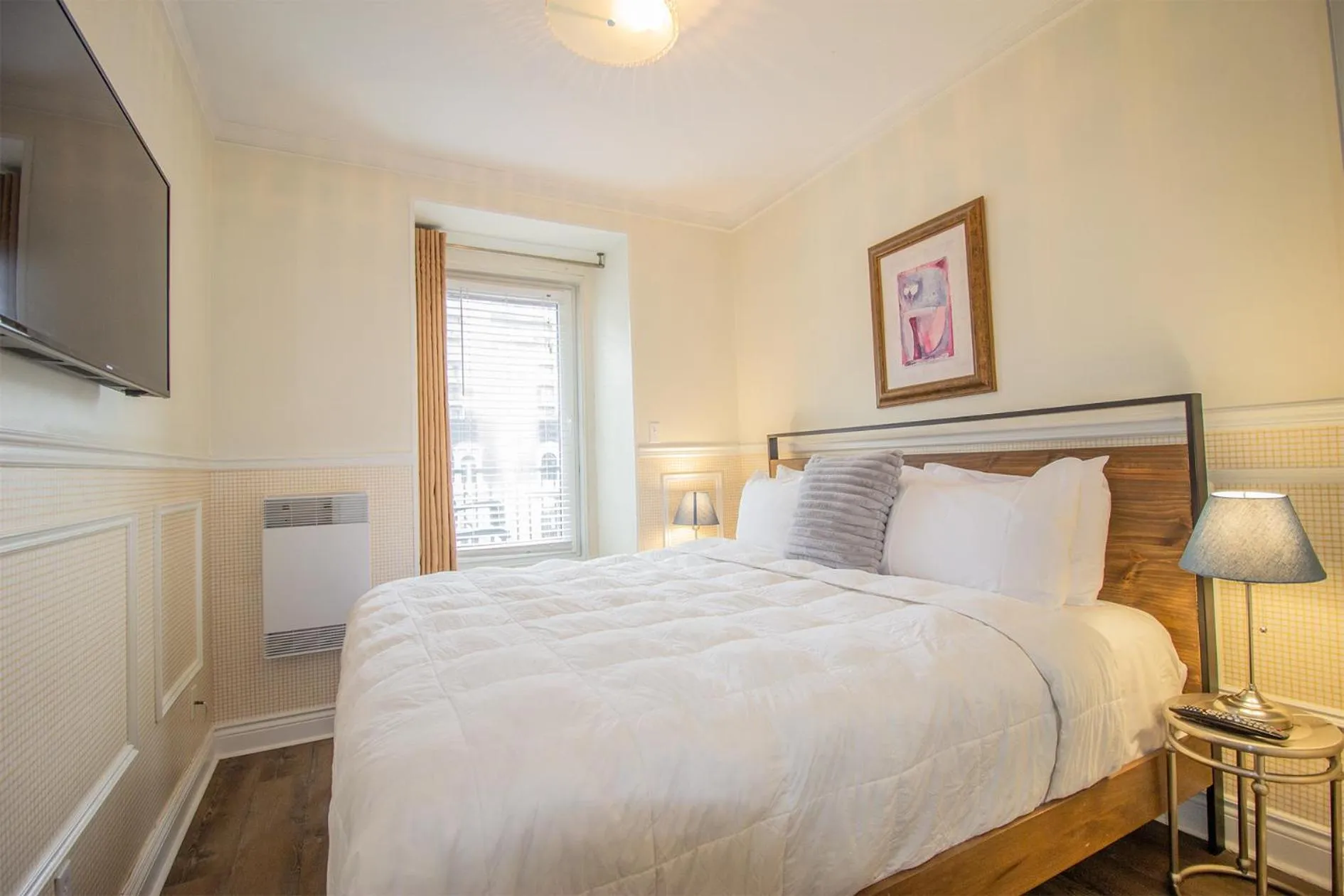 Bed in Parc Suites Hotel