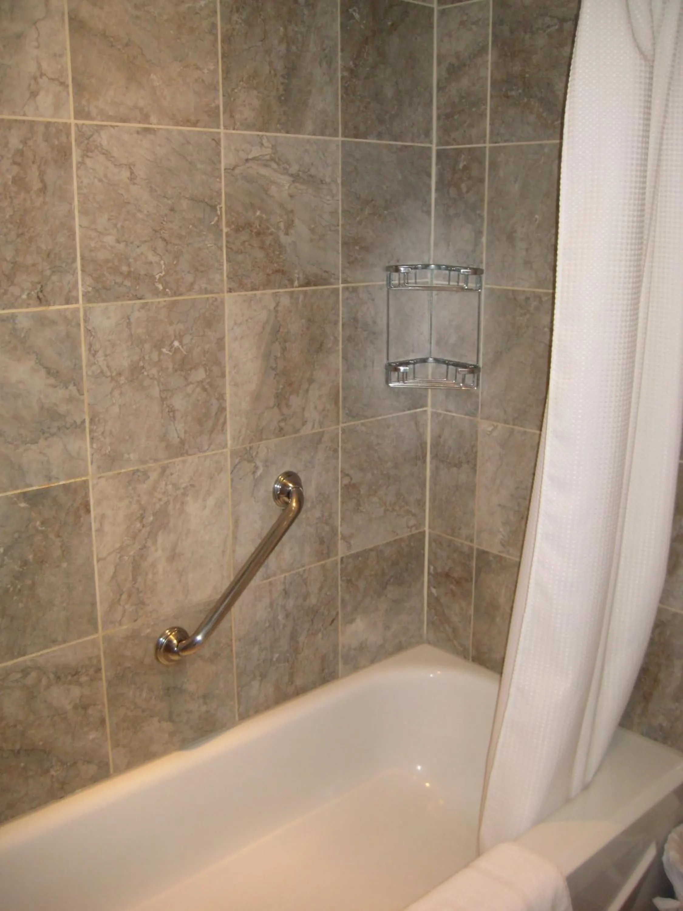 Shower in Parc Suites Hotel