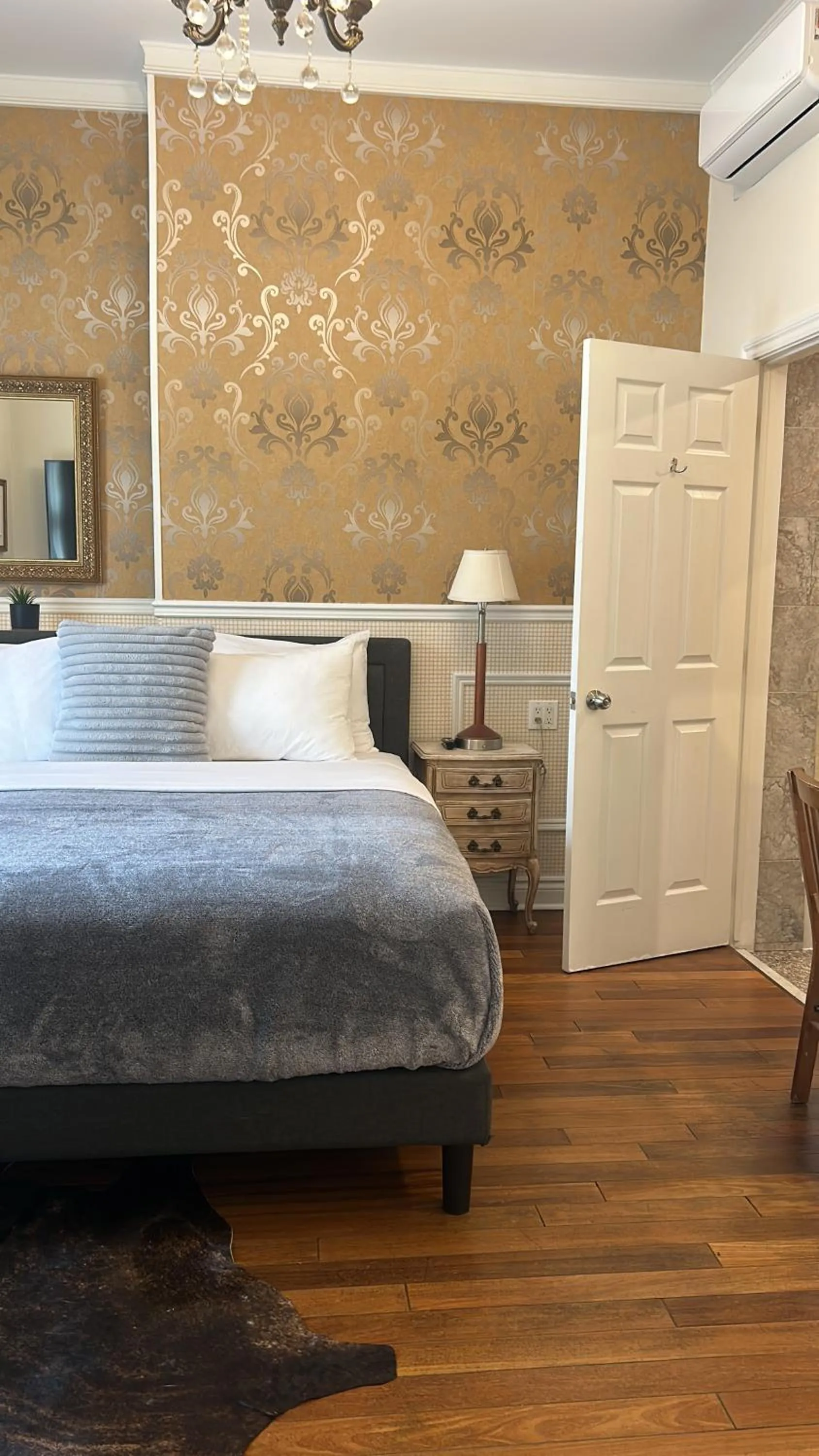 Bed in Parc Suites Hotel