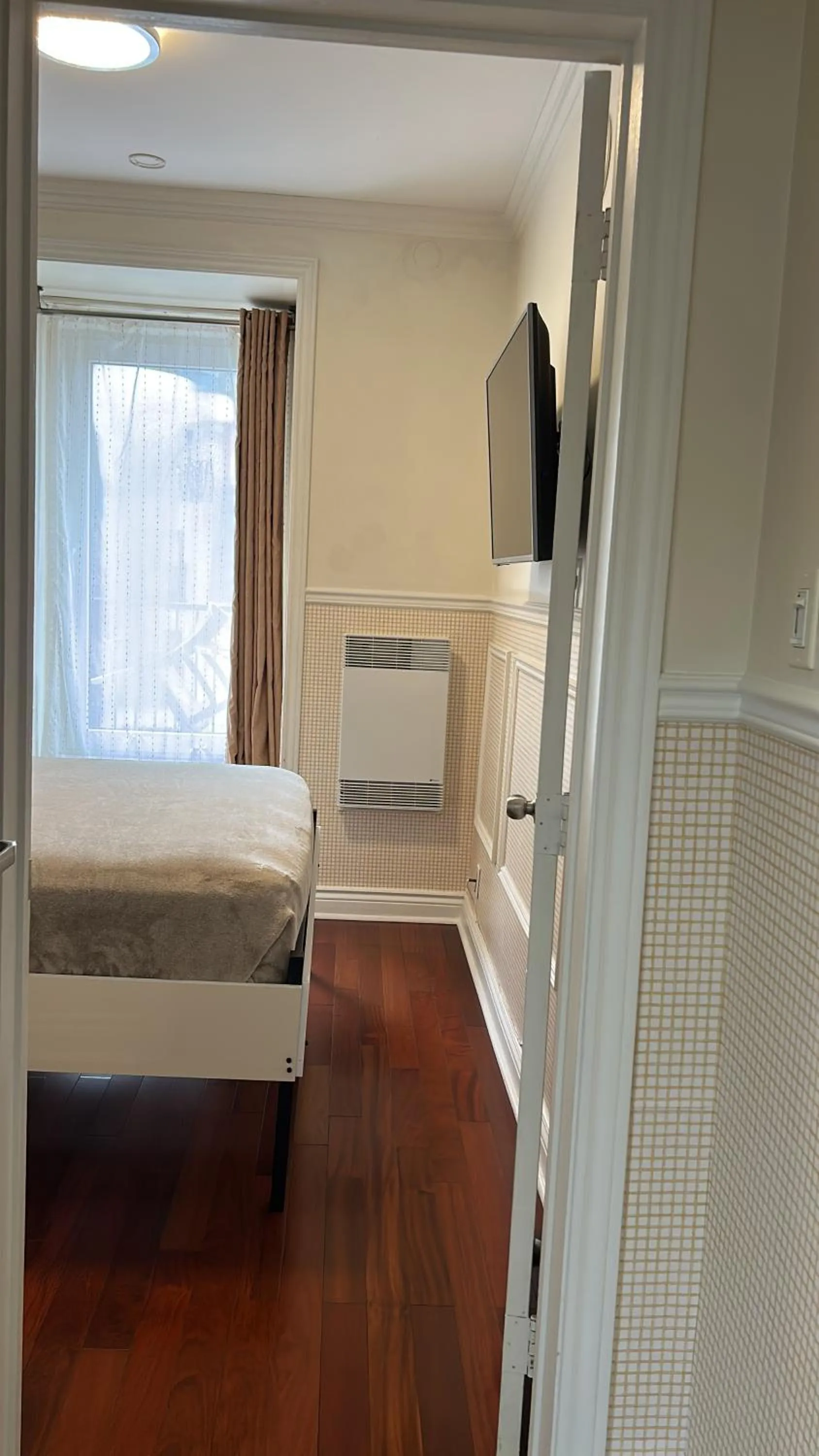 Bed in Parc Suites Hotel