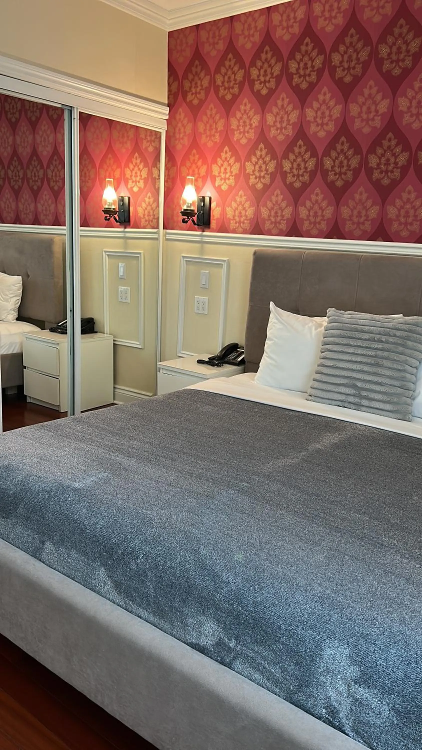 Bed in Parc Suites Hotel