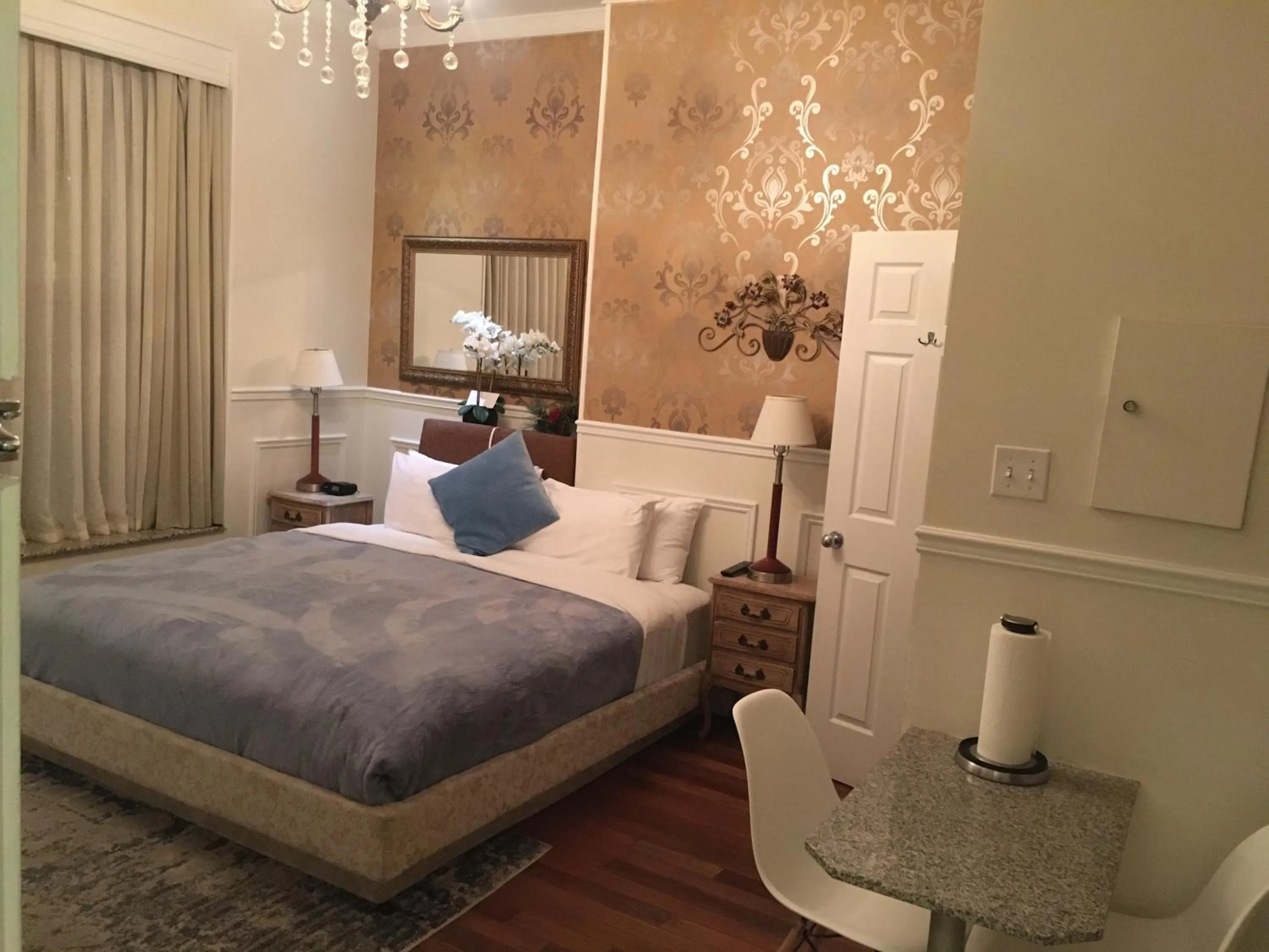 Bed in Parc Suites Hotel