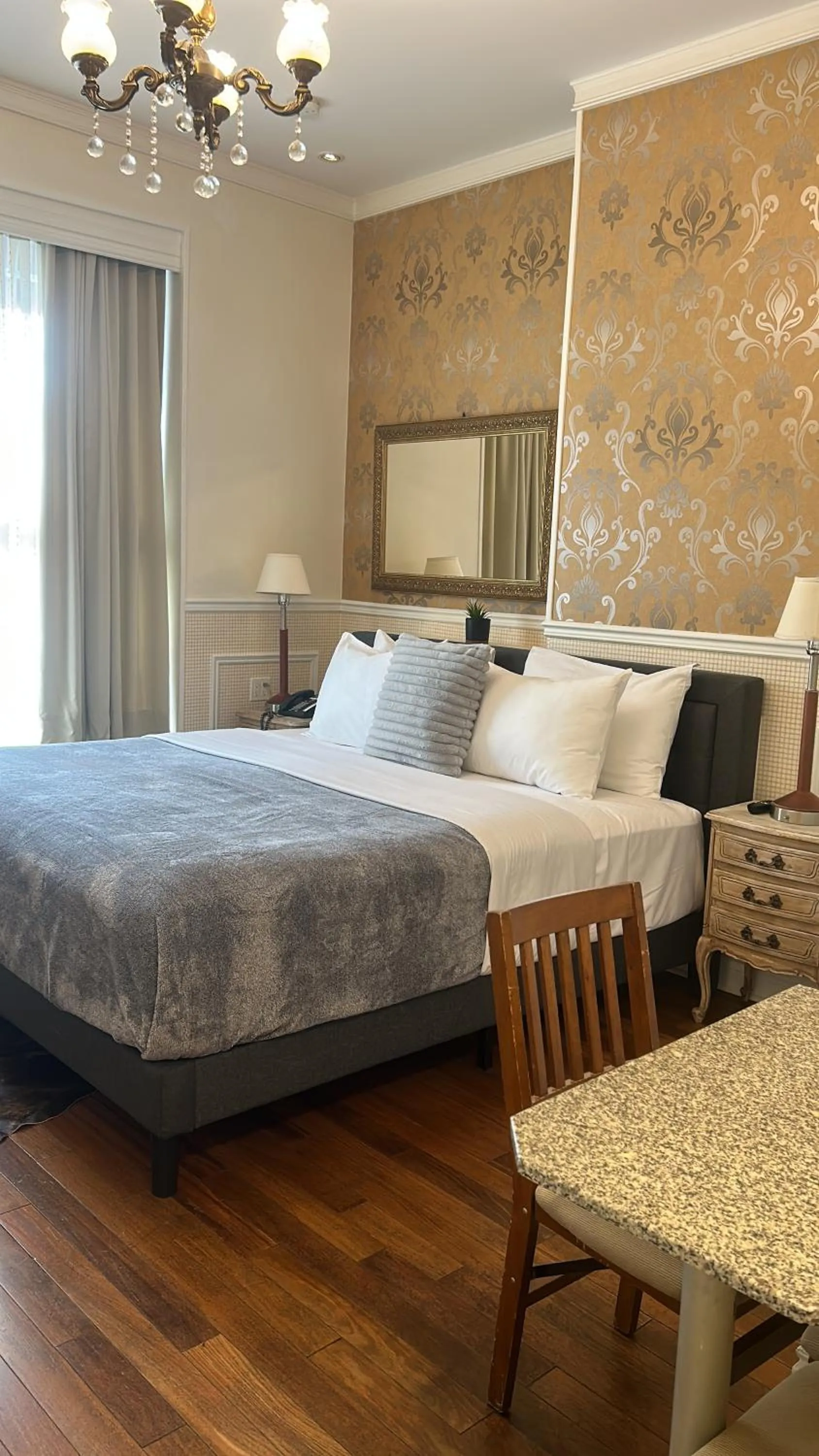 Bed in Parc Suites Hotel