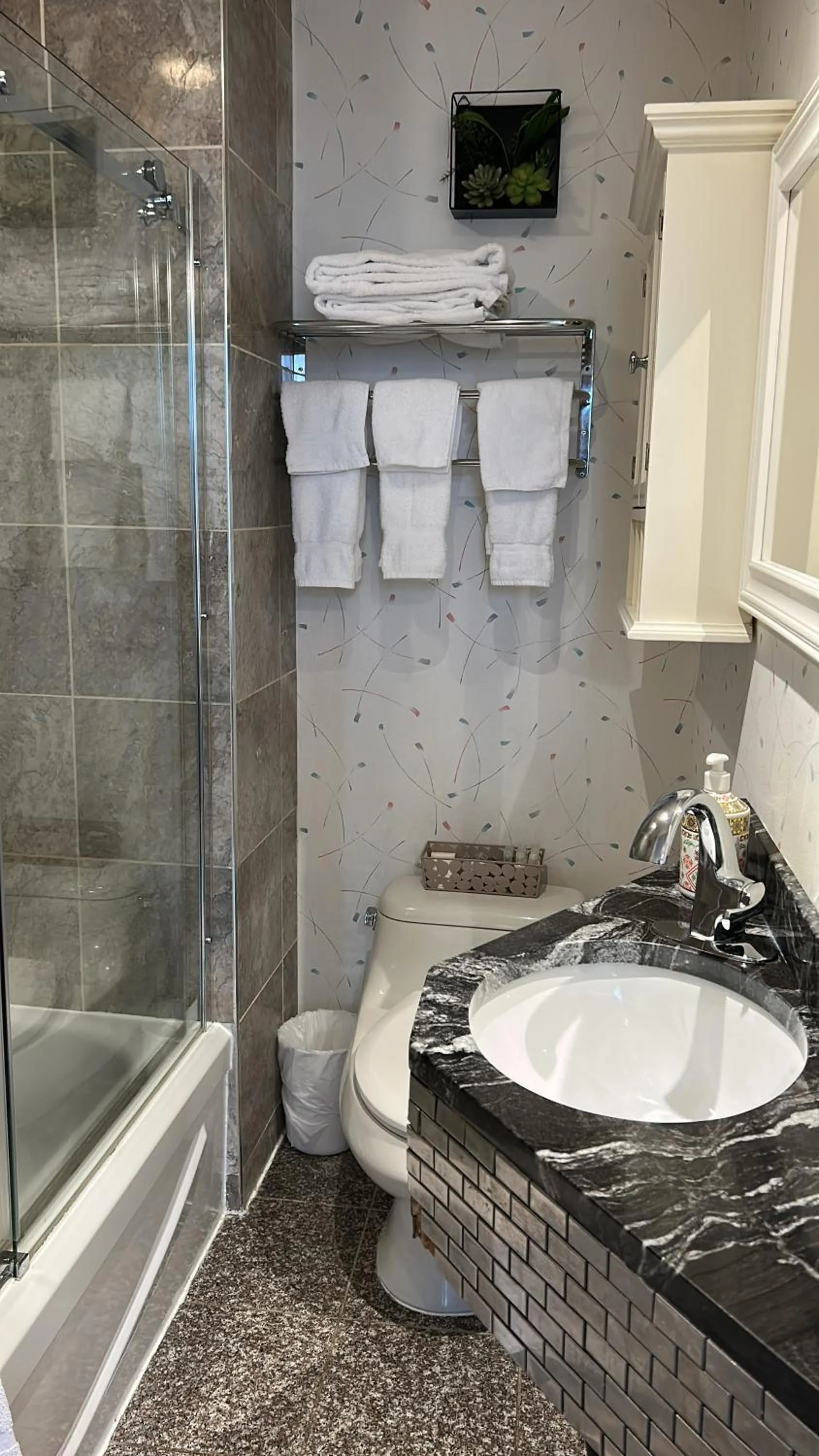 Shower in Parc Suites Hotel