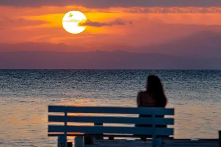 People in Pelican Beach Resort South Water Caye