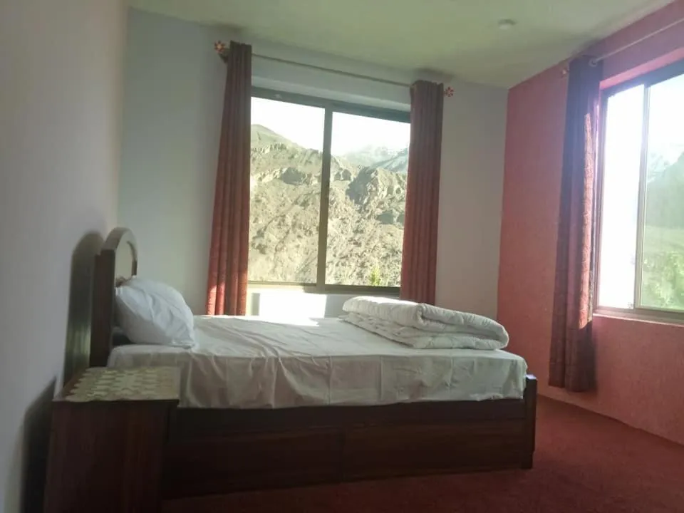 Bed in MasakAli Family Guest House