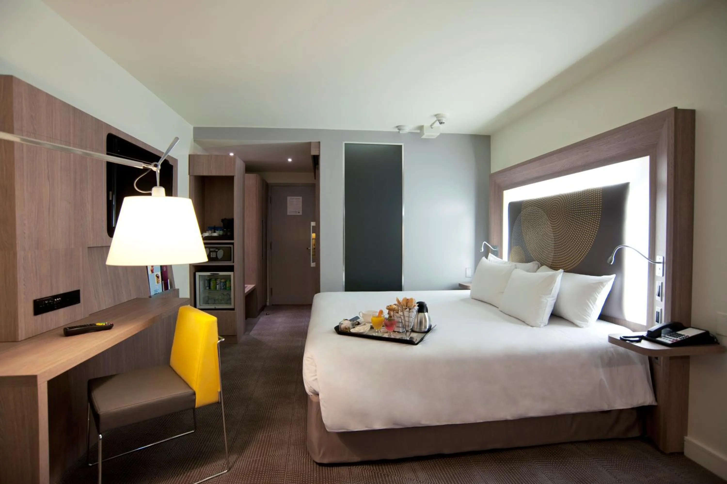 Bed in Novotel Toronto North York