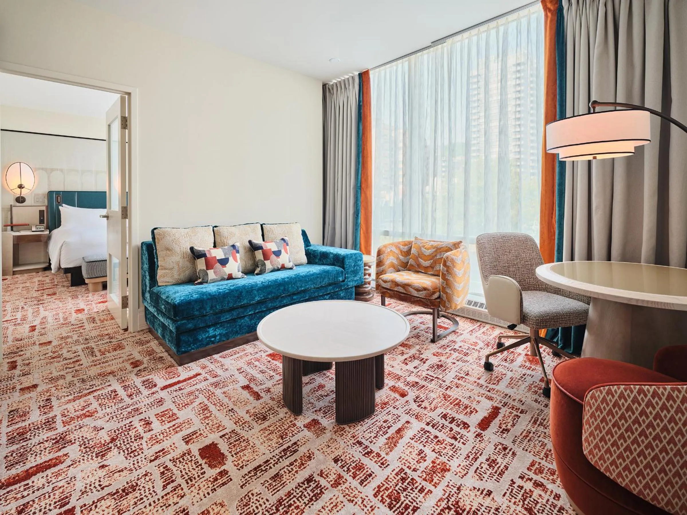 Living room, Bed in Sofitel Montreal Golden Mile