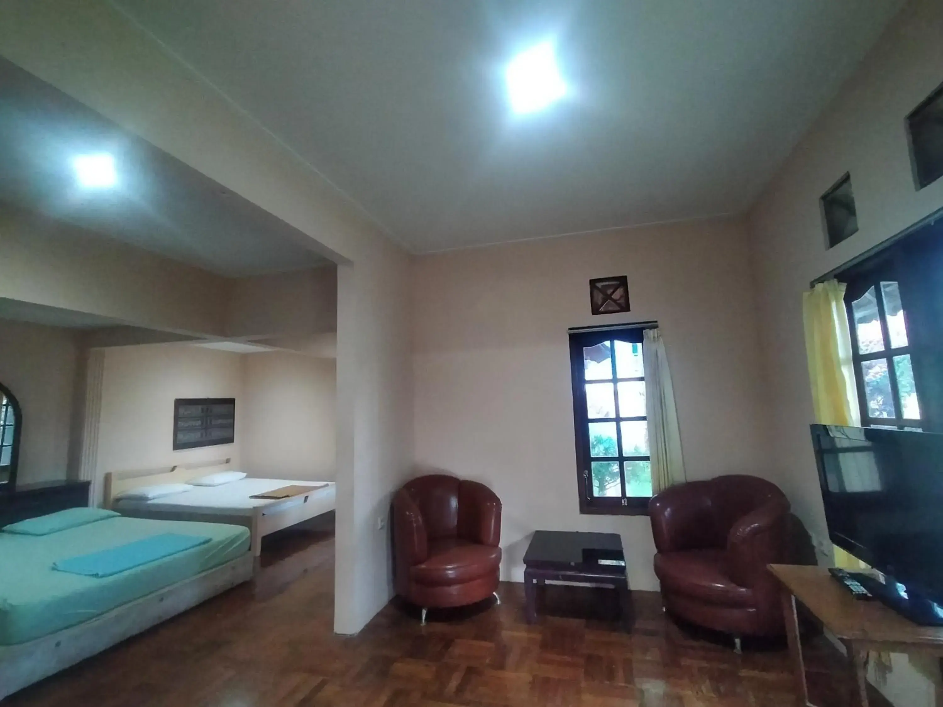 Bed in Villa Batu Tua Puncak Mitra RedDoorz Bed in Villa Batu Tua Puncak Mitra RedDoorz