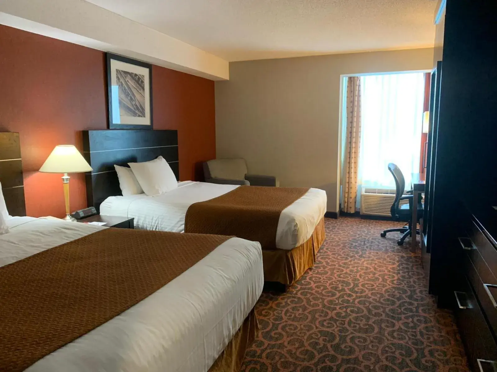 Bedroom, Bed in Ramada by Wyndham Niagara Falls/Fallsview Bedroom, Bed in Ramada by Wyndham Niagara Falls/Fallsview