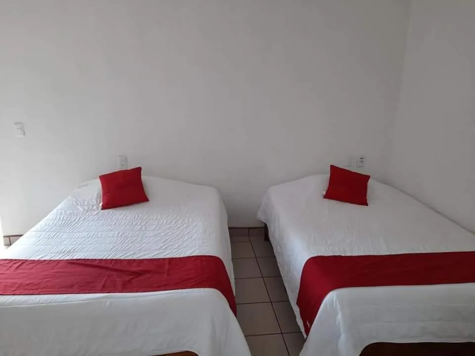 Bed in Hotel y Bungalows Bugambilias