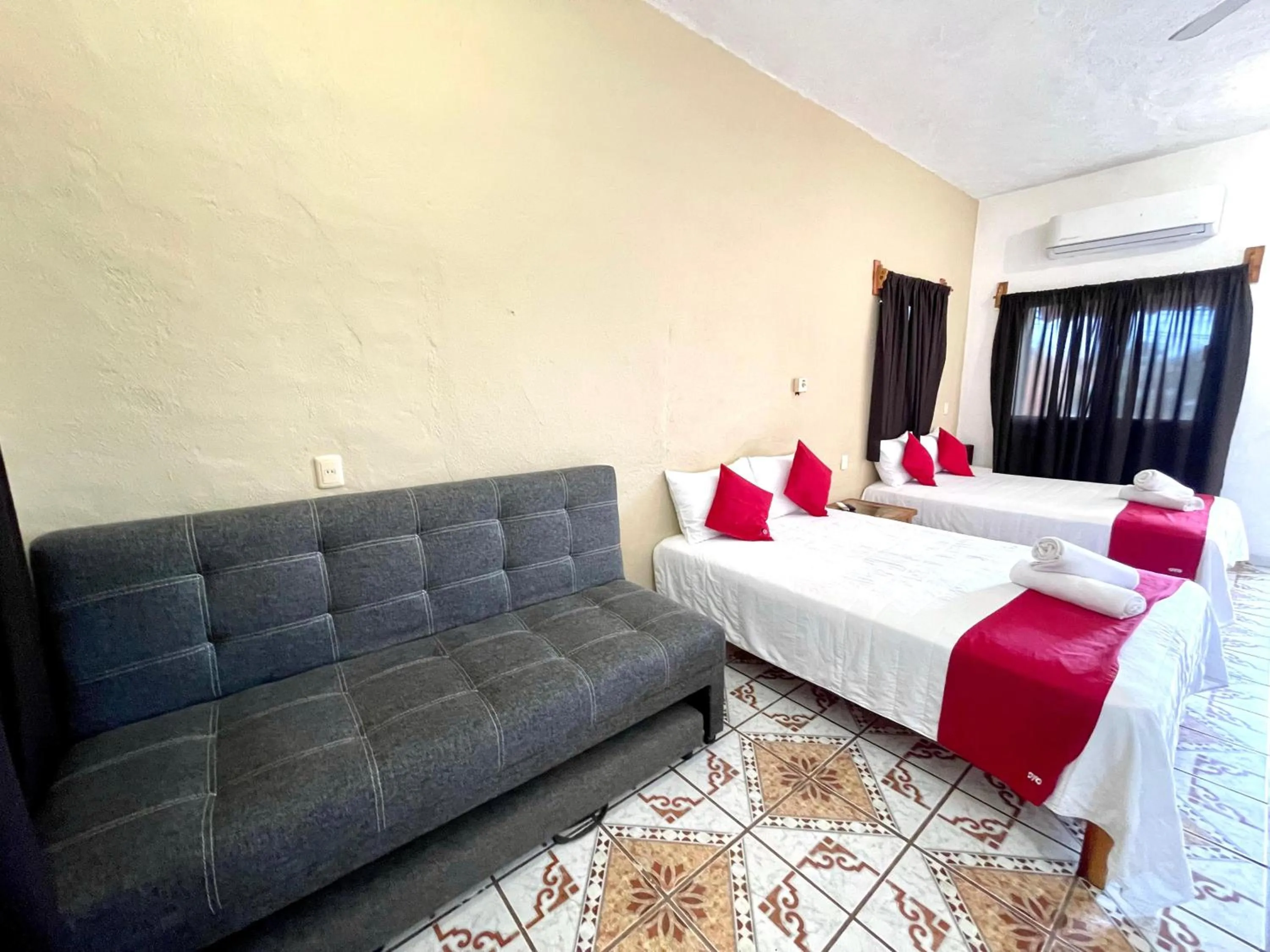 Bed in Hotel y Bungalows Bugambilias