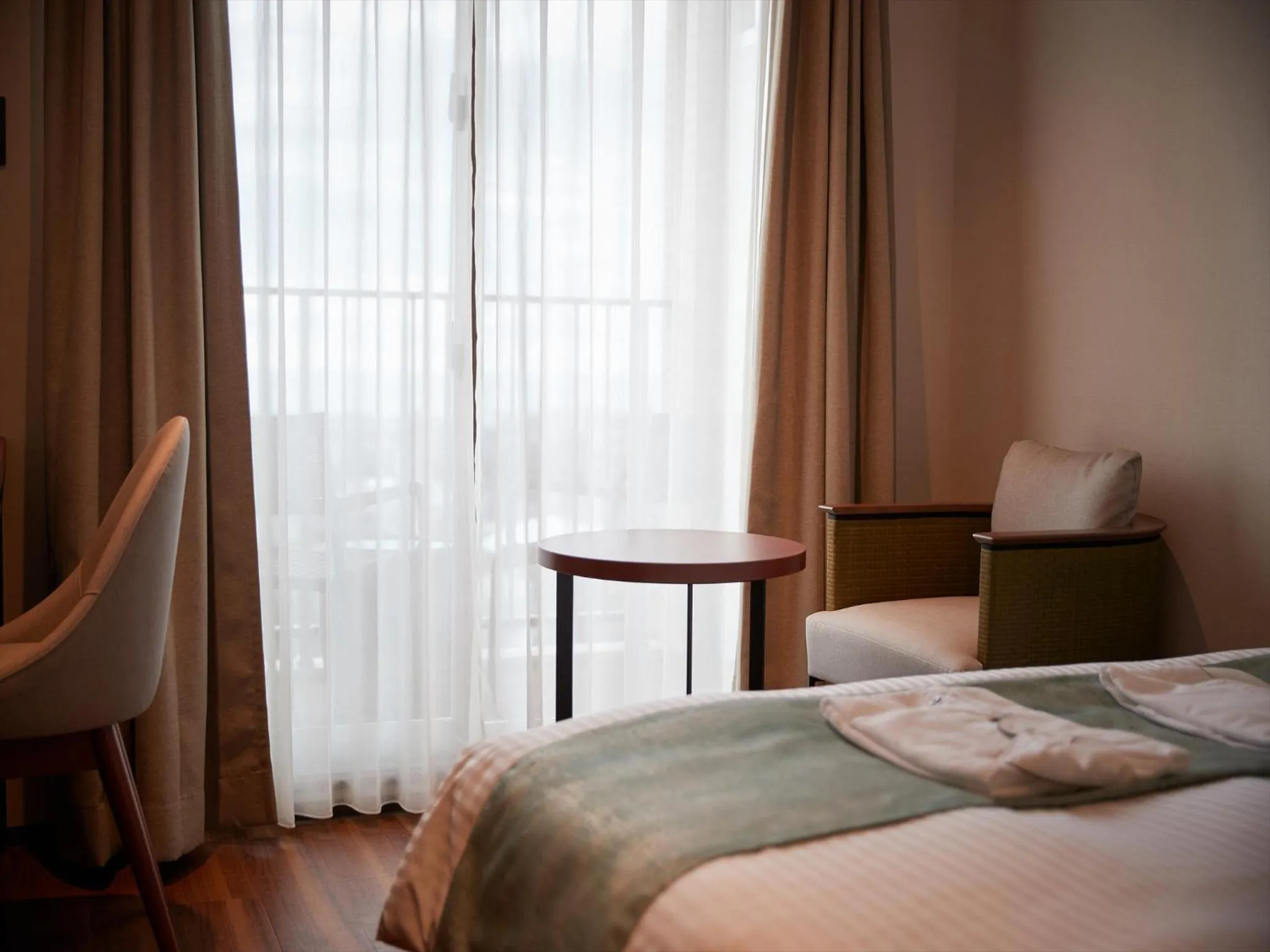 Photo of the whole room, Bed in THE GRAND HOTEL GINOWAN