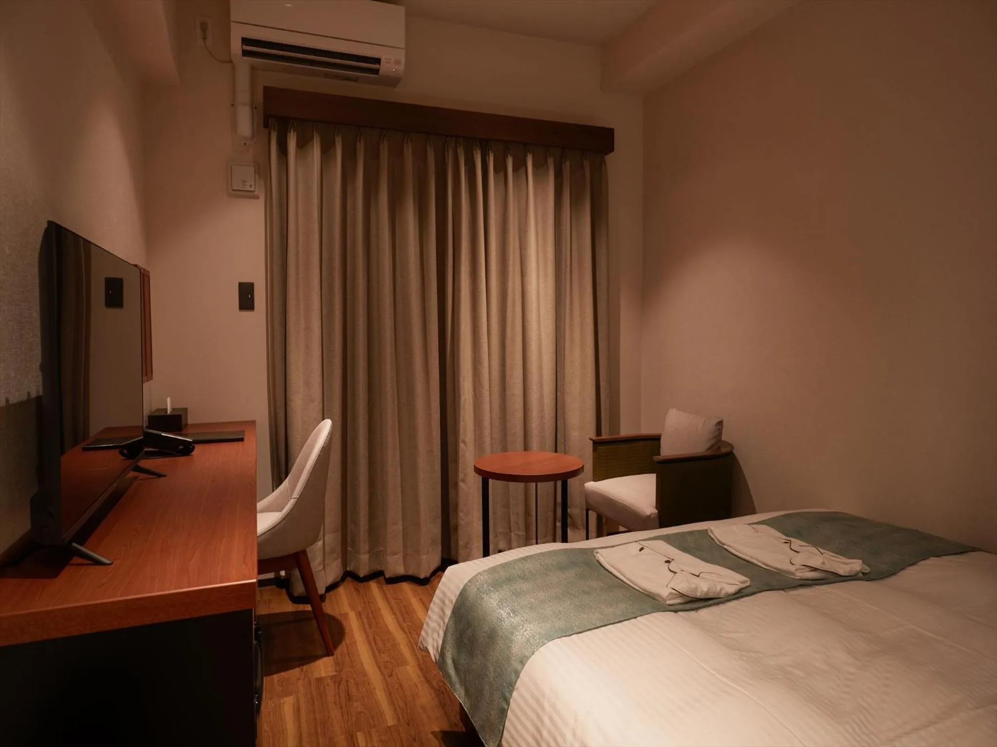 Photo of the whole room, Bed in THE GRAND HOTEL GINOWAN