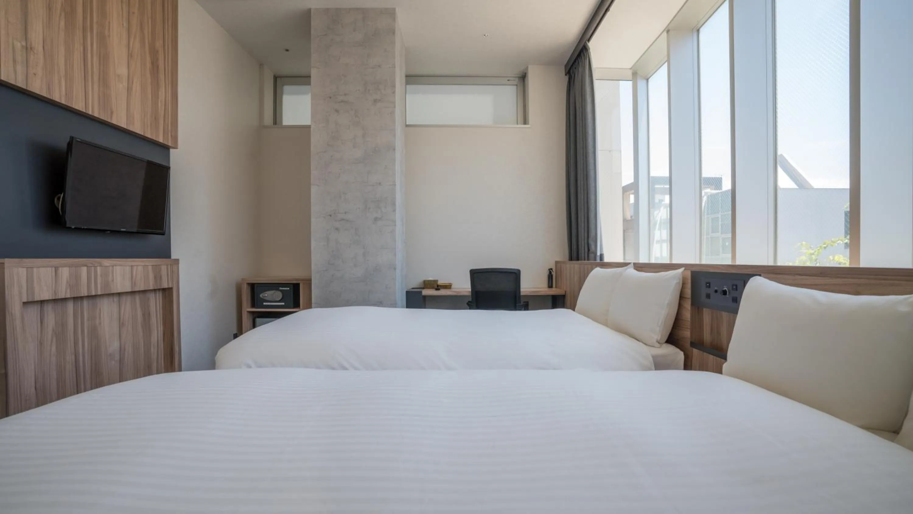 Bed in EIGHT POINT INN Kanazawa