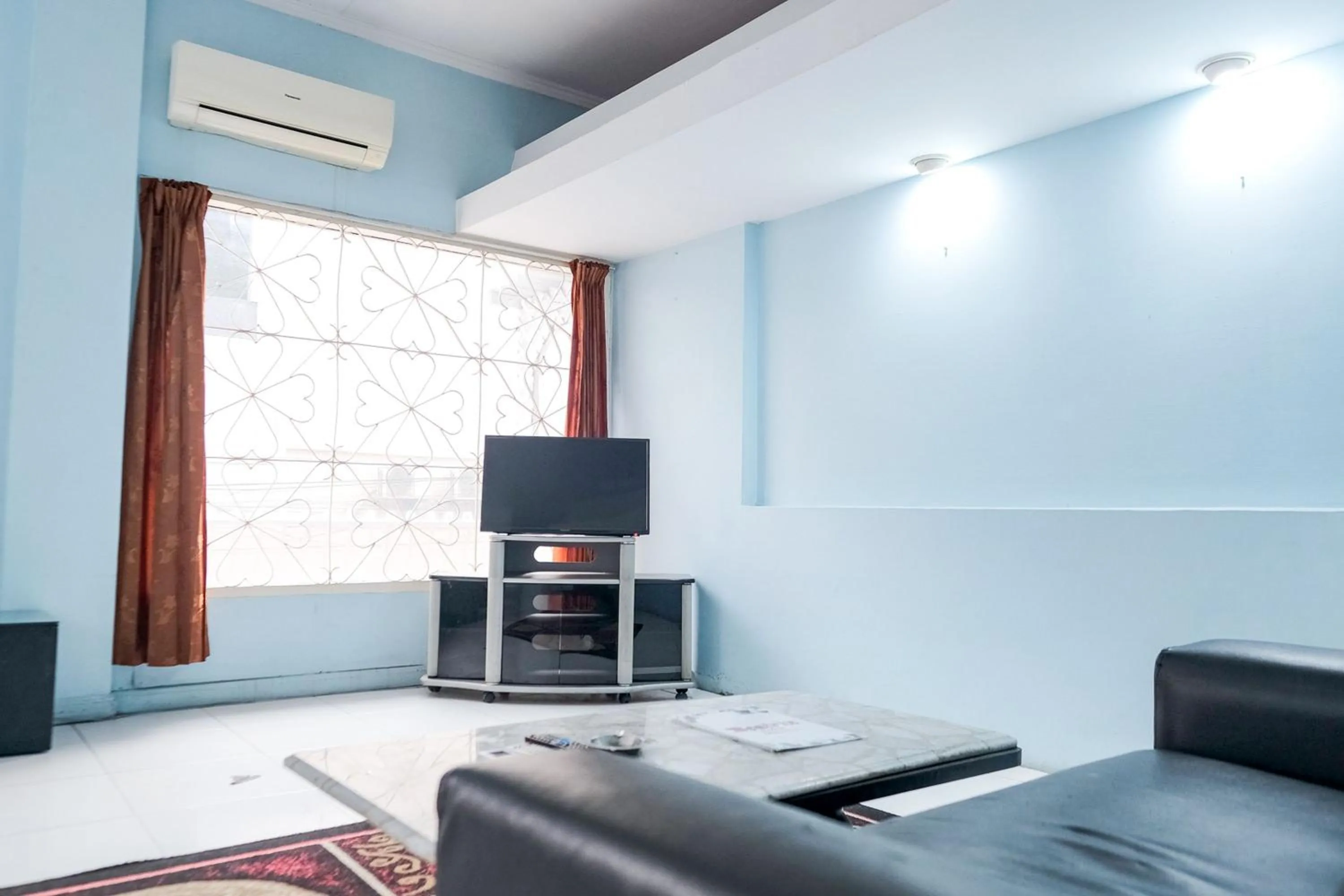 TV and multimedia in RedDoorz Plus @ Jalan Iskandar Muda Medan