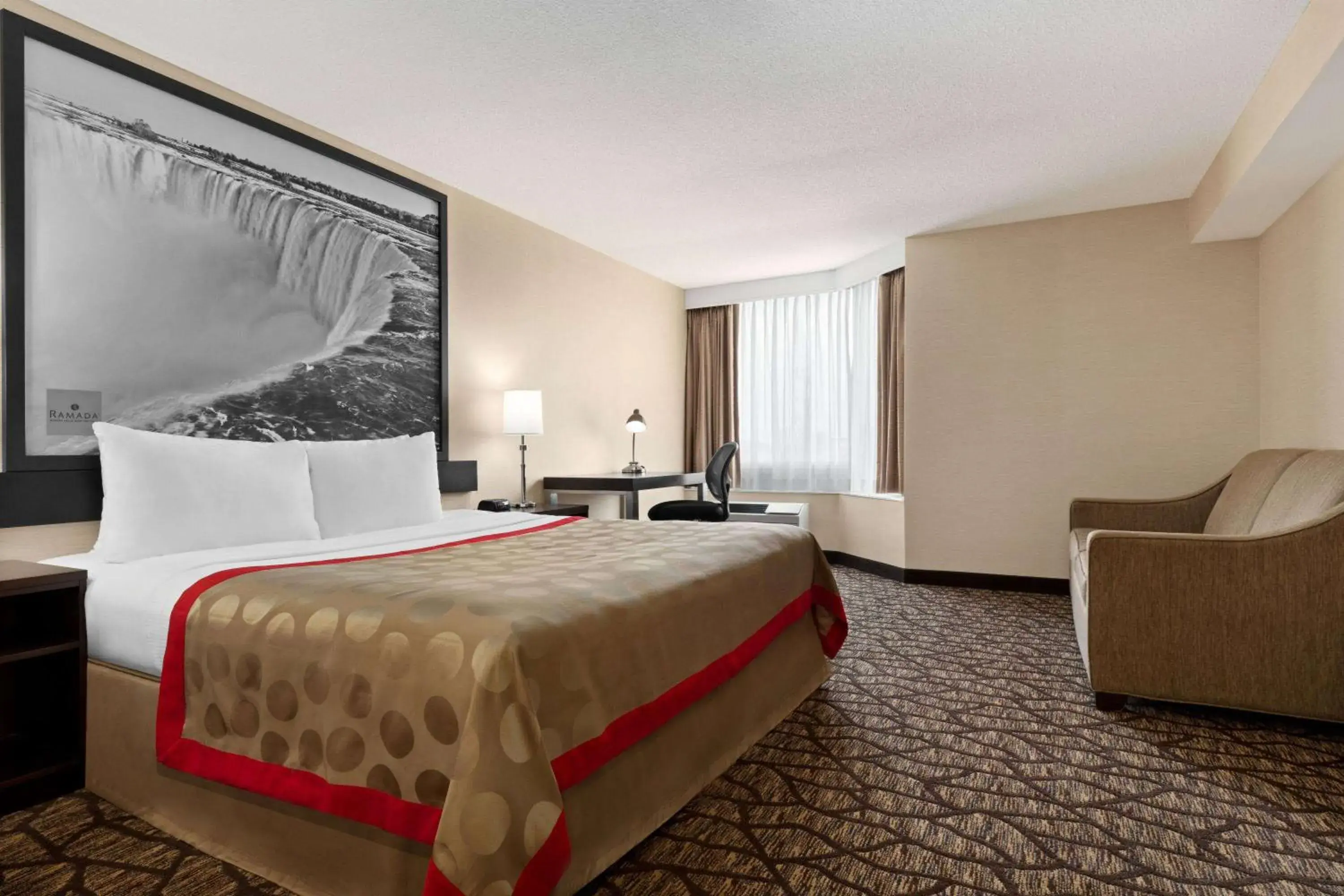 Photo of the whole room, Bed in Ramada By Wyndham Niagara Falls near the Falls Photo of the whole room, Bed in Ramada By Wyndham Niagara Falls near the Falls